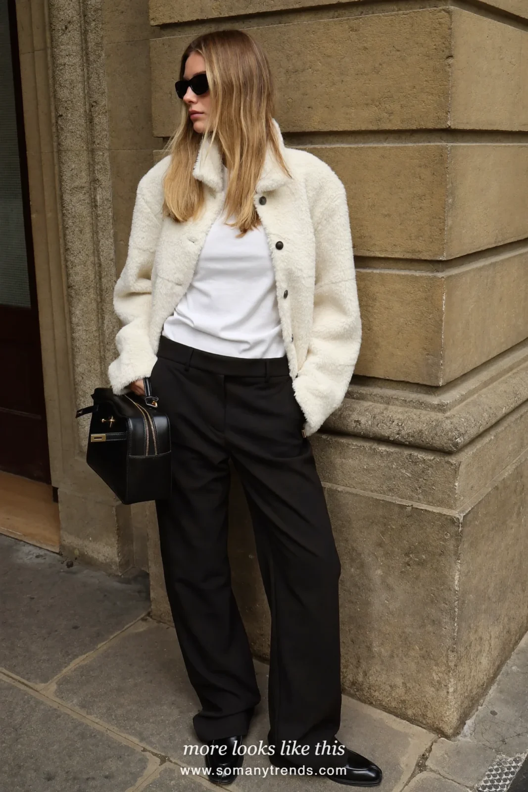 Cropped cream teddy jacket over white tee, black wide-leg pants and black loafers, outfit 19