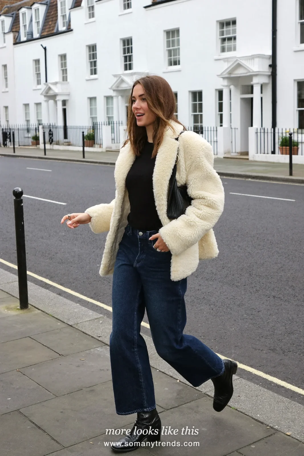Cropped cream teddy jacket over black tee, wide dark jeans and black ankle boots, outfit 26
