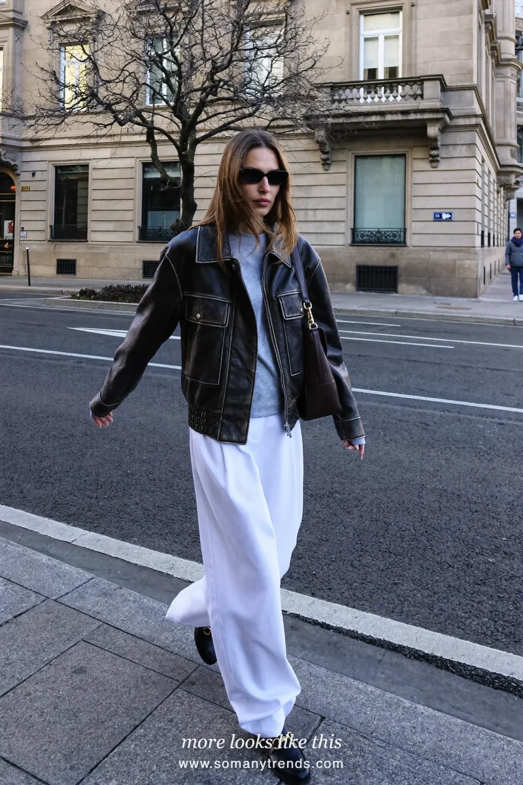 Look 13: black leather jacket, gray tee, wide white pants and black loafers