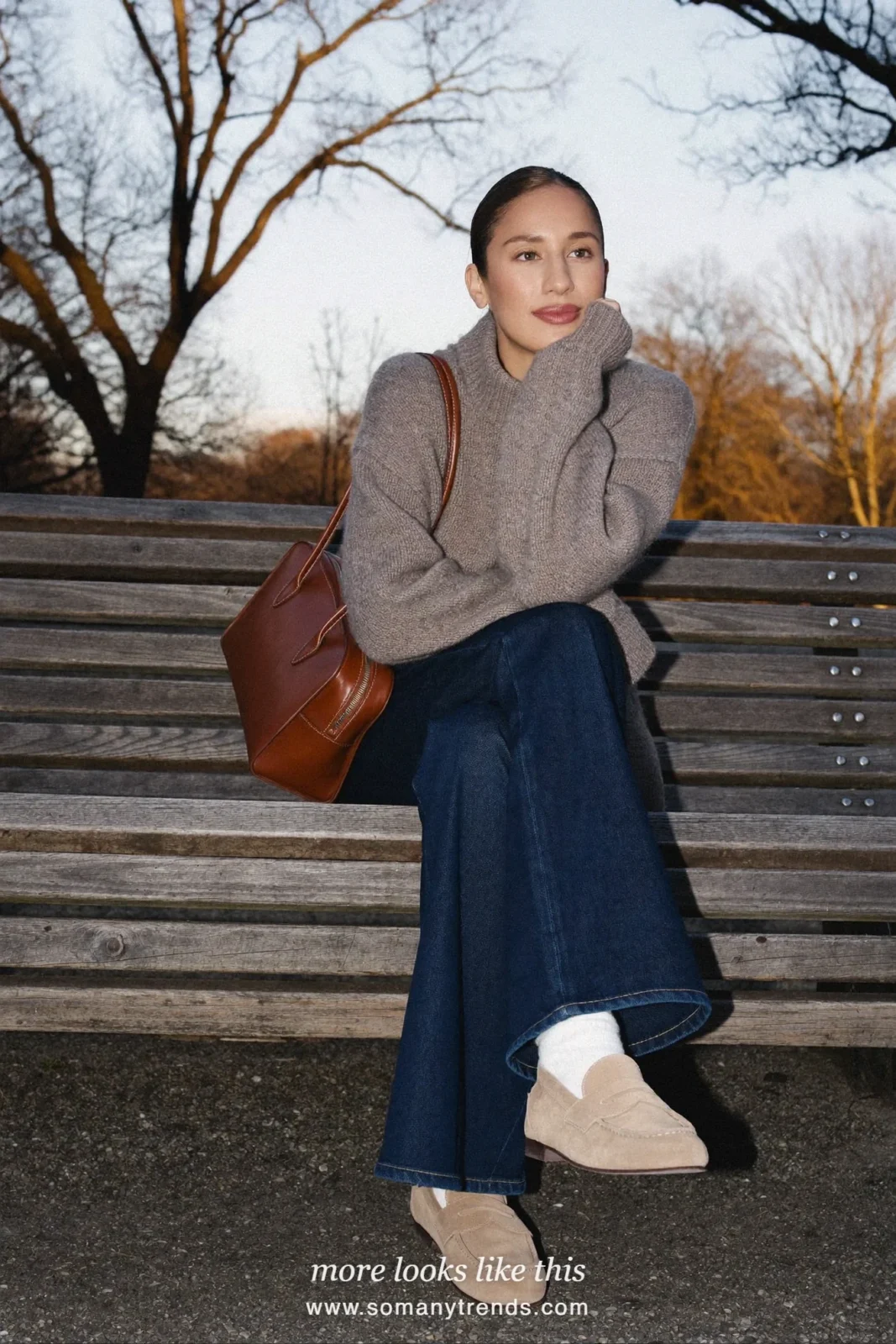Look 15: taupe sweater, dark flare jeans and beige suede loafers