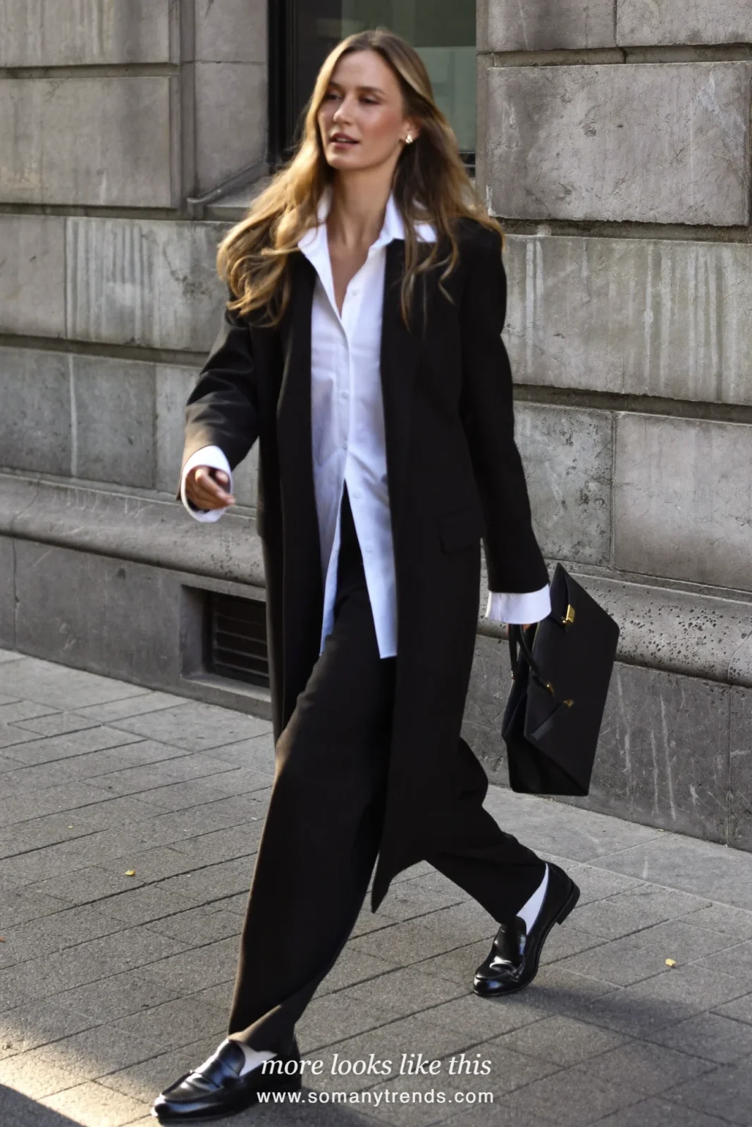 Look 17: black long blazer, white collared shirt, black pants and black loafers
