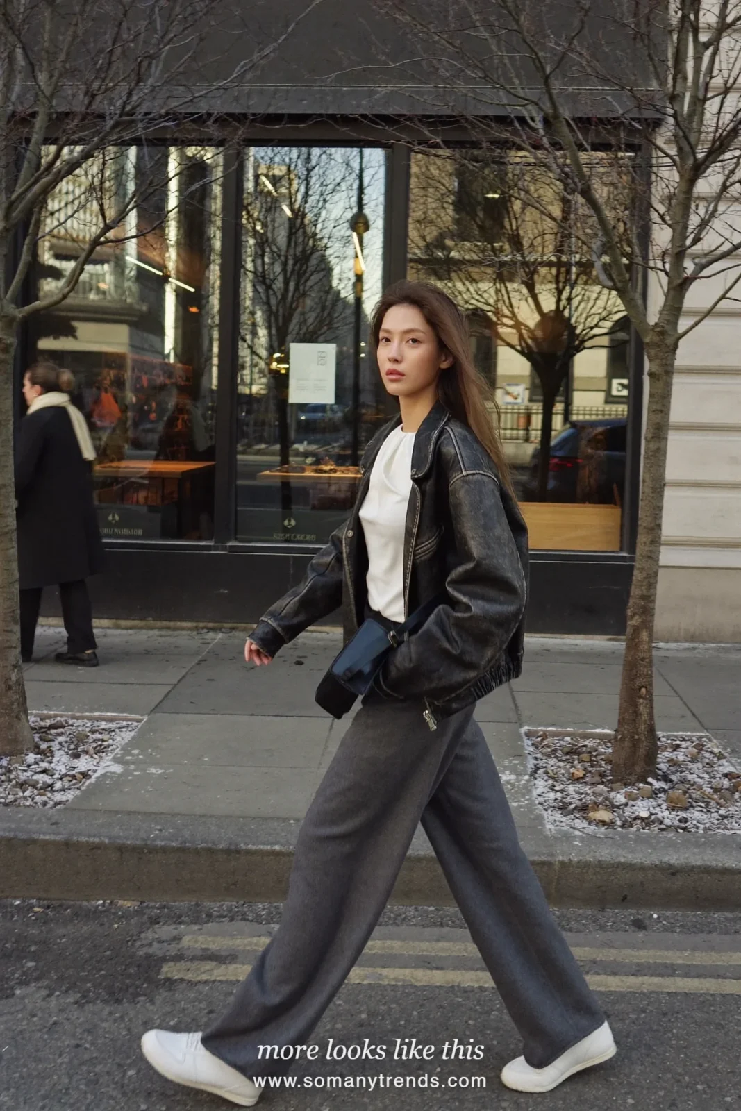 Woman in gray wide-leg pants, black leather jacket, white tee and sneakers, outfit 25