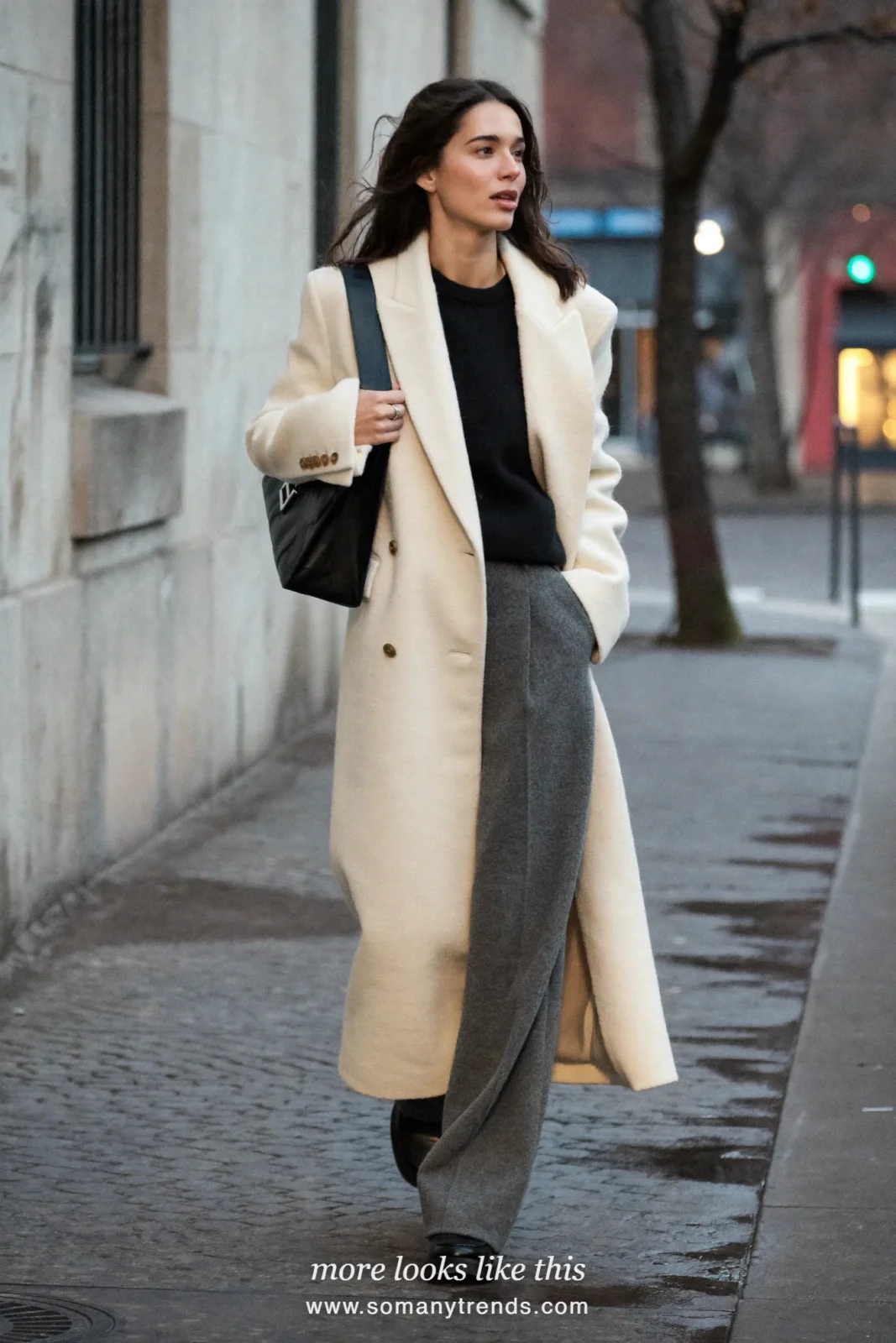 Woman in gray wide-leg pants, long cream wool coat, black knit and chunky loafers, outfit 31