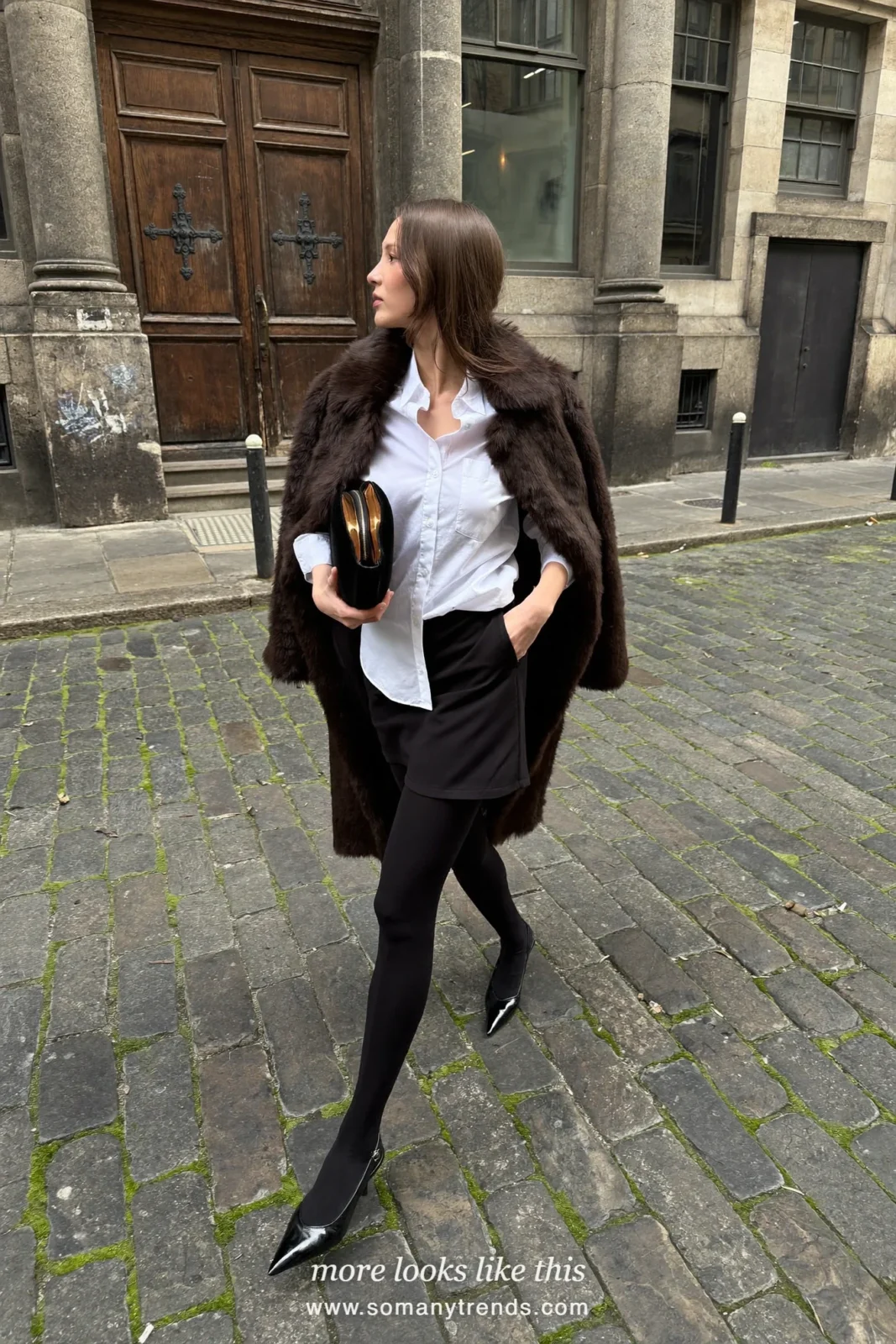Long dark brown faux fur coat over a white button-down, black straight skirt, sheer black tights and black slingbacks, outfit 3