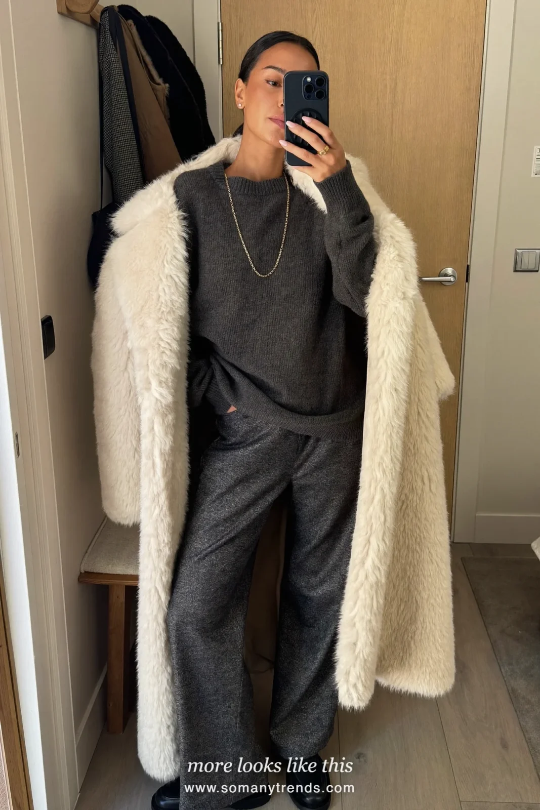 Charcoal ribbed knit sweater, gray wide-leg pants and black loafers photographed as a hallway mirror selfie, outfit 4