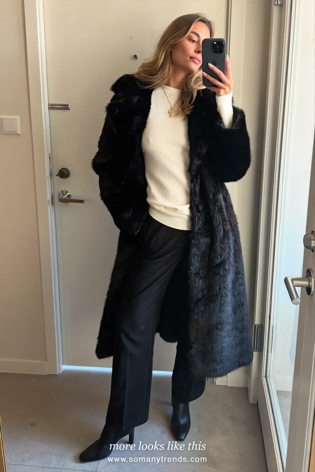 Ivory fine-knit top, black wide pants and black heeled ankle boots photographed as a hallway mirror selfie, outfit 28
