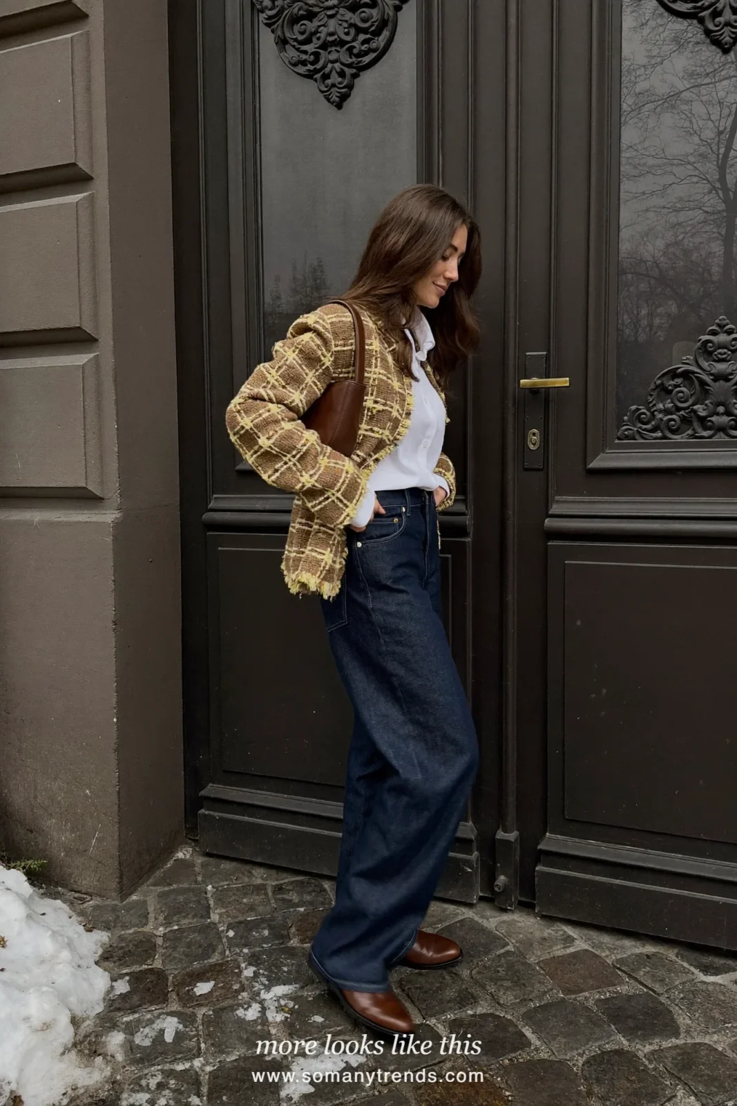 Woman in a brown tweed jacket, white shirt, dark straight jeans and flat brown boots in Paris, outfit 22