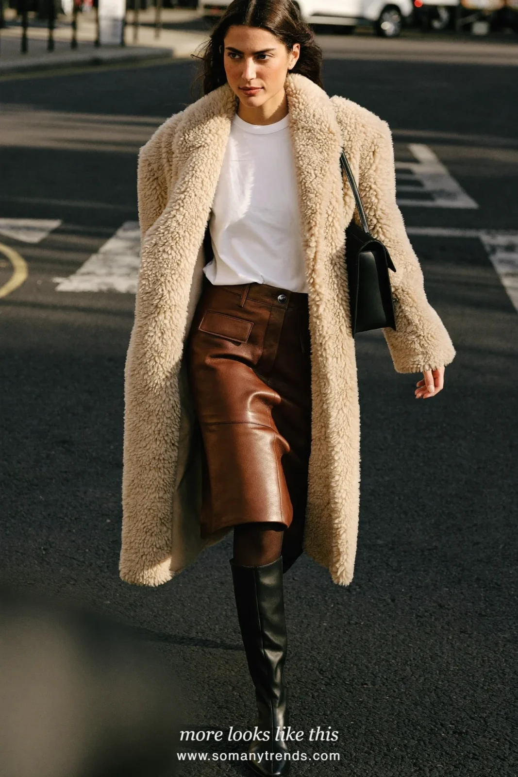 Long beige teddy coat over white tee, chocolate leather knee-length skirt, sheer tights and boots, outfit 15