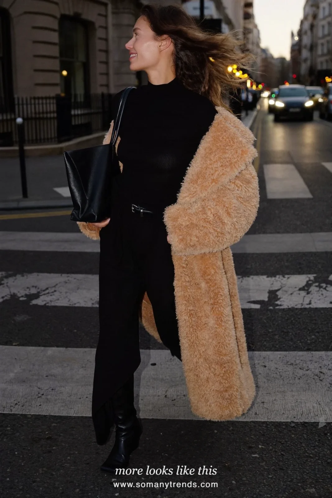 Long beige shaggy coat over black top, black wide-leg pants and black boots, outfit 18