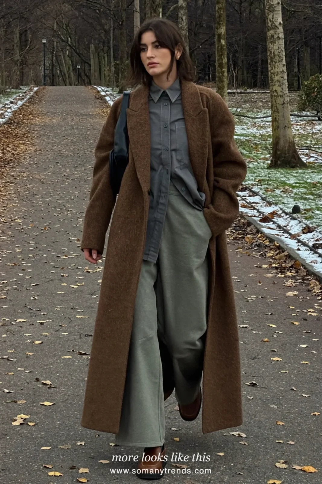 Look 14: brown long coat, gray shirt, sage wide pants and brown loafers