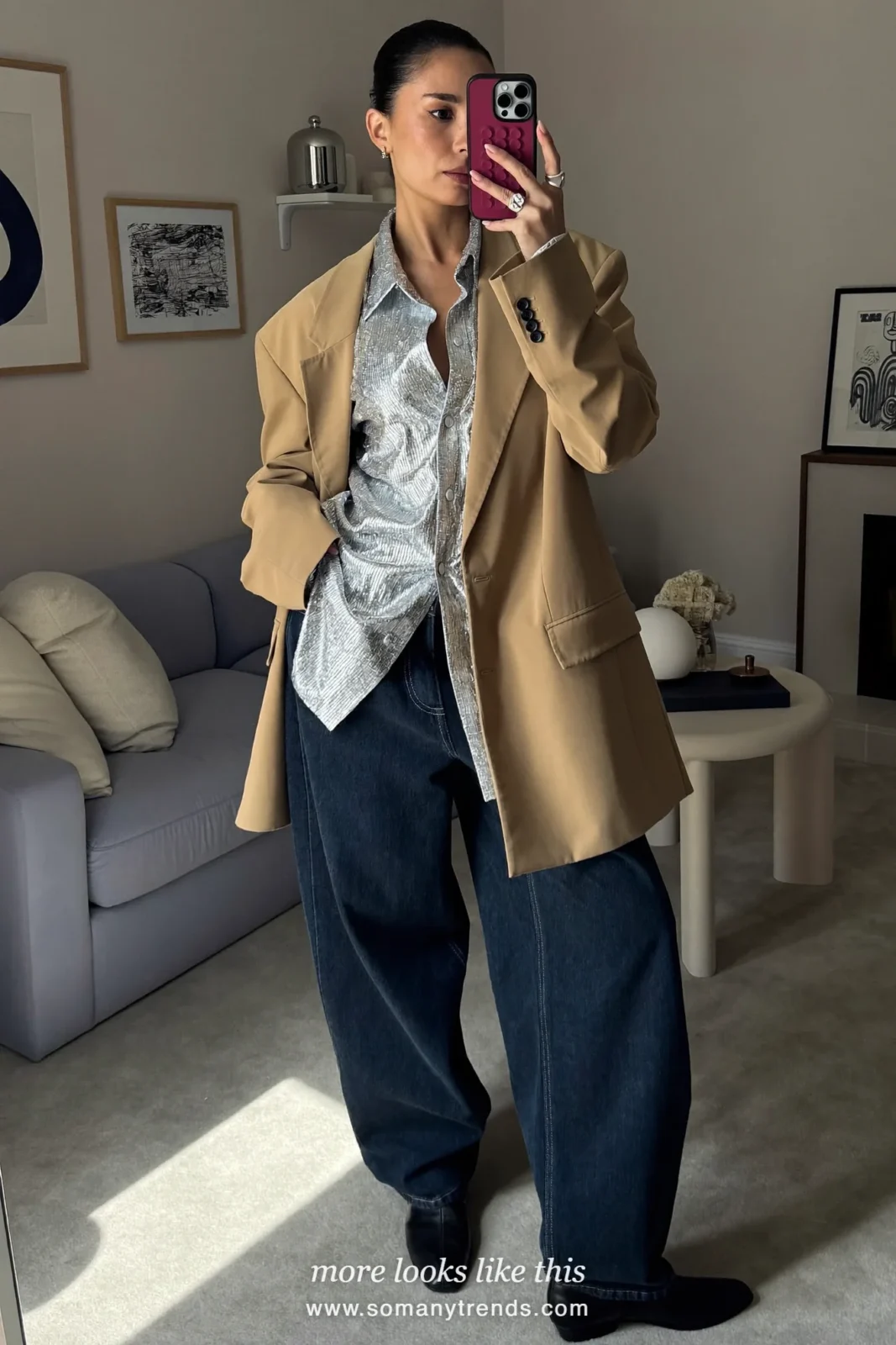Woman in a tan blazer, sequin button shirt, dark straight jeans and ankle boots, house party outfit 12