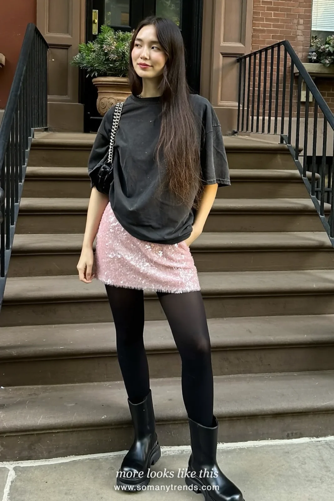 Woman in a faded black tee, pink sequin mini skirt, black tights and chunky boots, house party outfit 13
