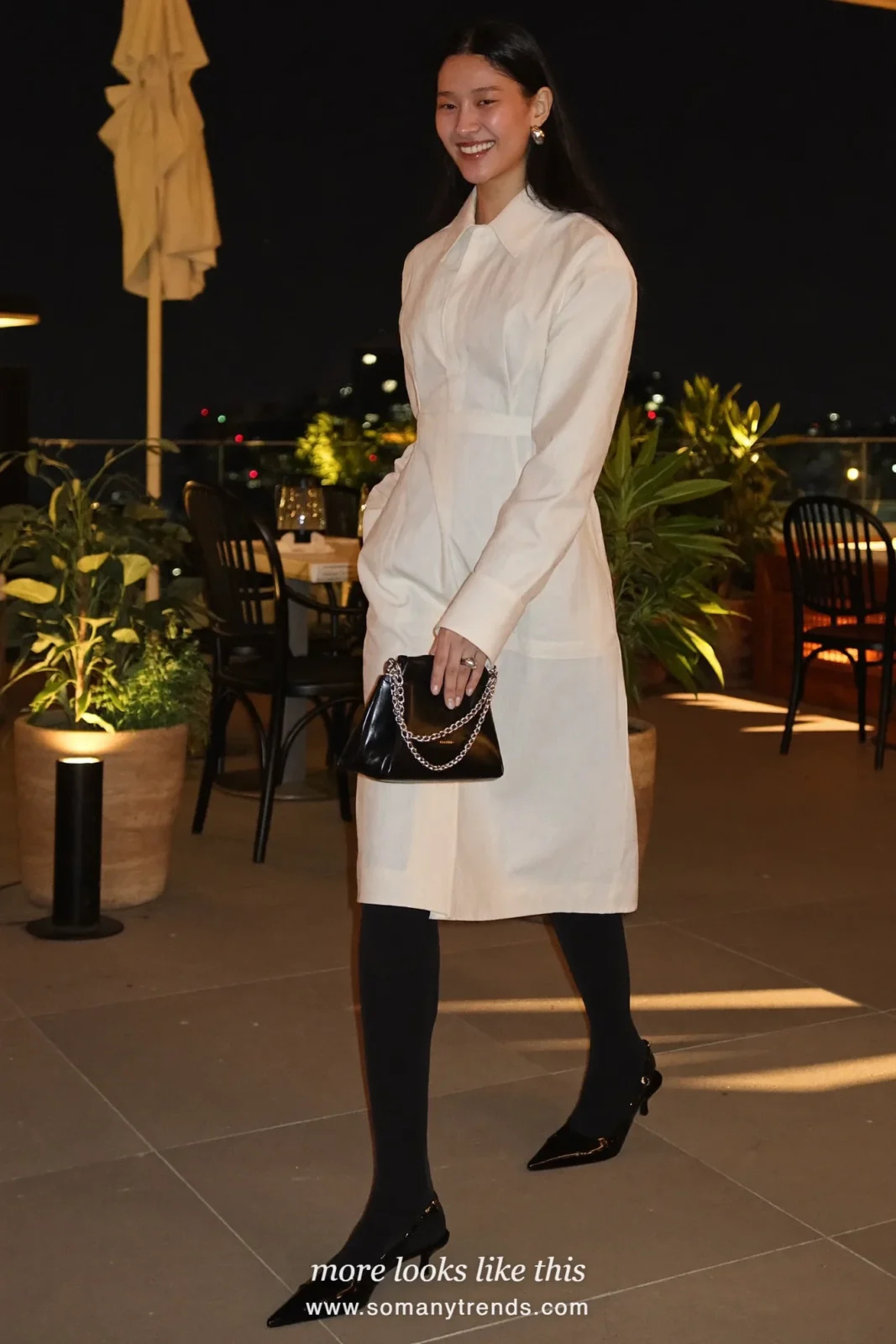 Woman in ivory midi shirt dress, black sheer tights and black slingbacks, outfit 21