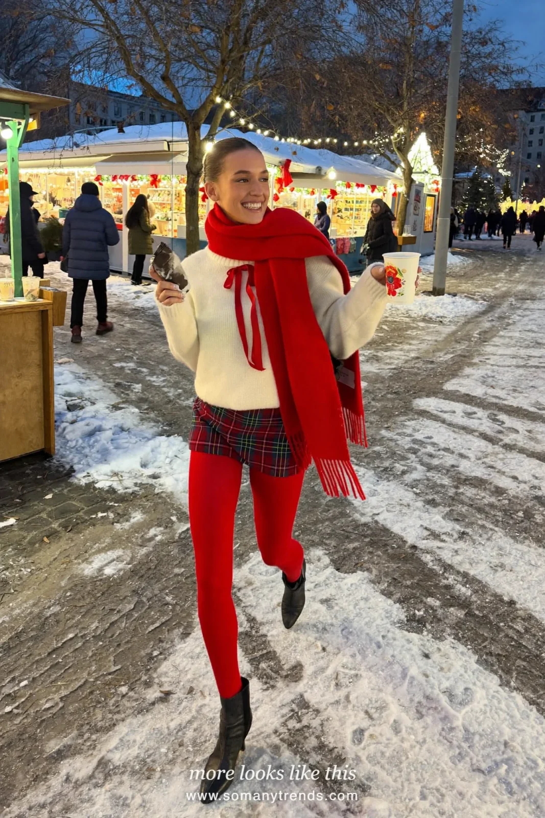 Woman in a white mohair sweater with a red bow, red and black tartan mini shorts, sheer red tights, black boots and a red scarf, outfit 2