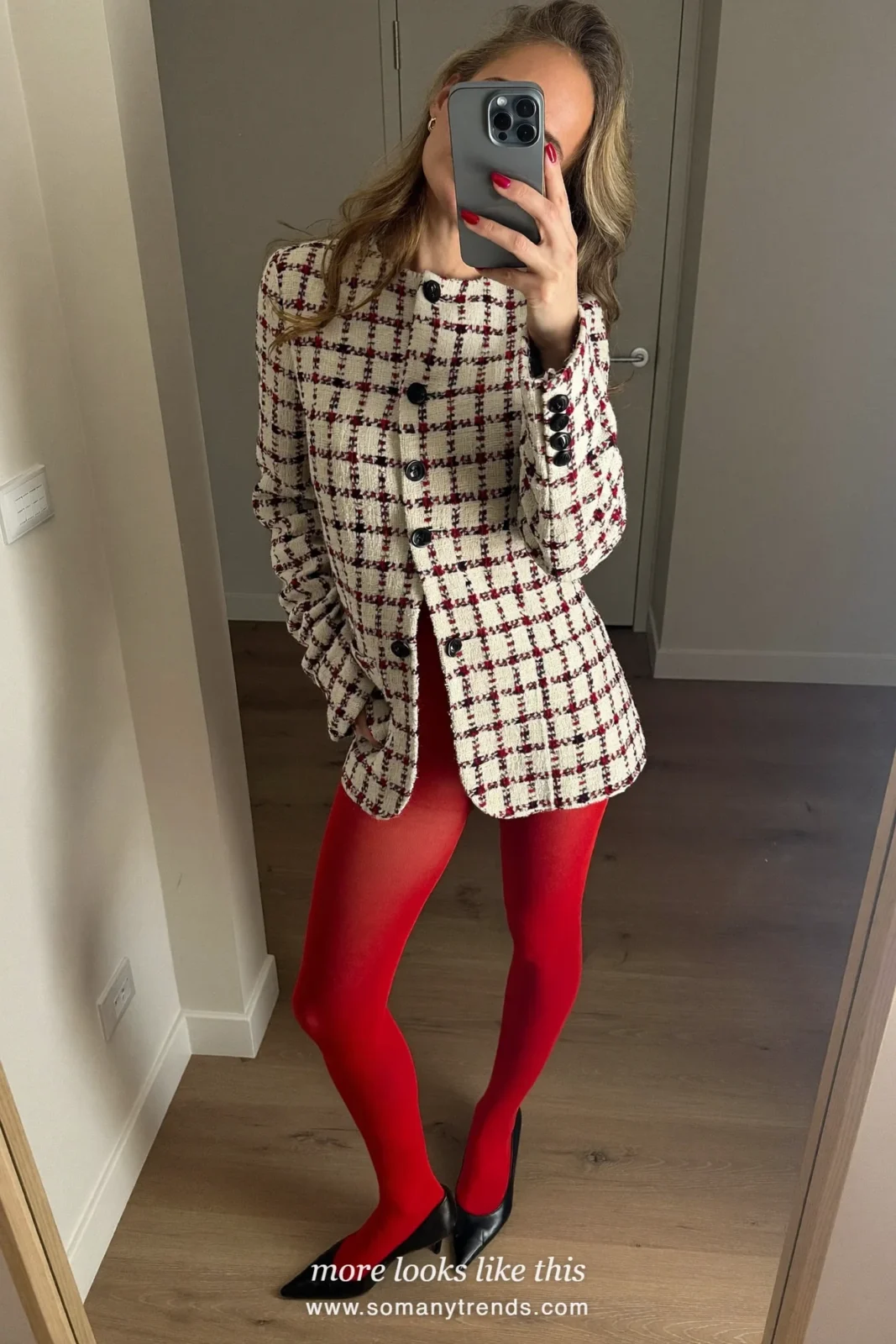 Woman in a cream and red tweed blazer dress, sheer red tights and black pointed pumps, outfit 3