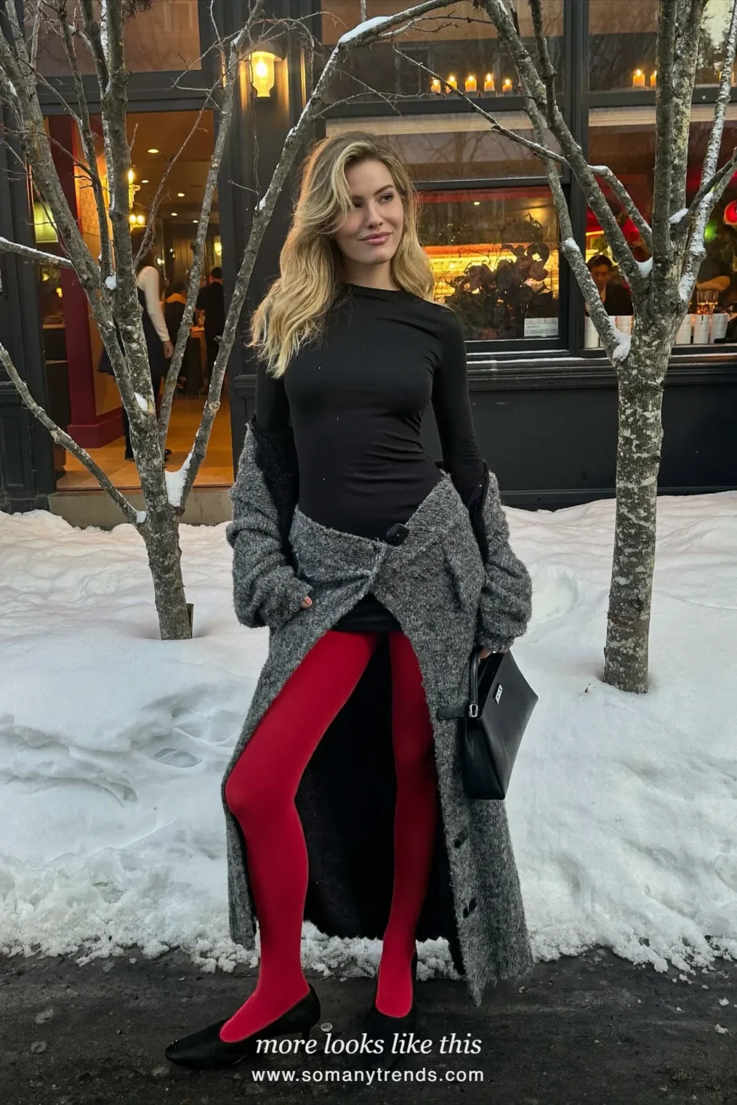 Woman in a black slip mini dress, long gray chunky cardigan, sheer red tights and black low pumps, outfit 20