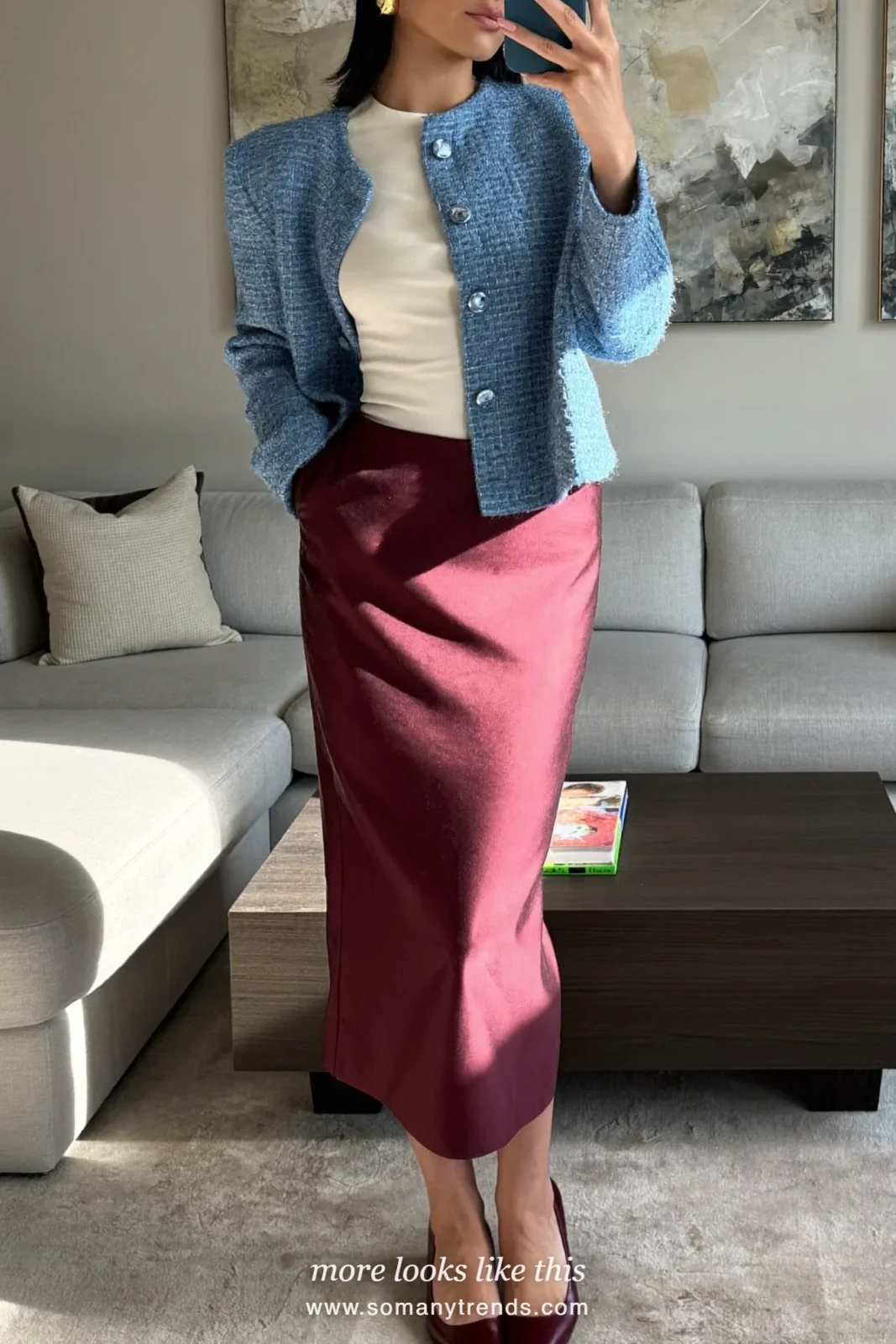 Woman in a baby blue tweed jacket, a burgundy satin midi skirt and burgundy pumps, outfit 9