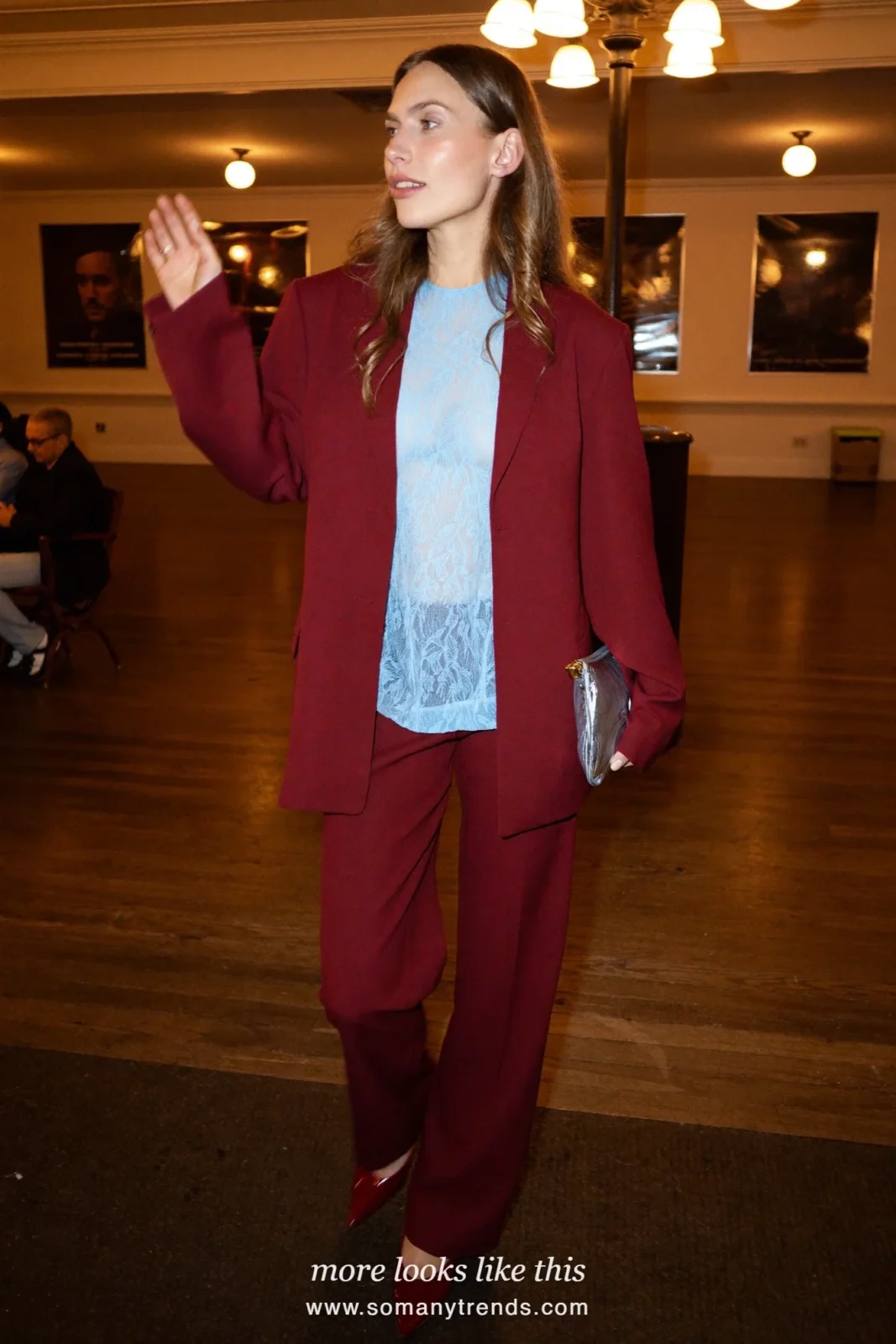 Woman in a burgundy wool crepe suit with a baby blue lace blouse and burgundy pointed pumps, outfit 22