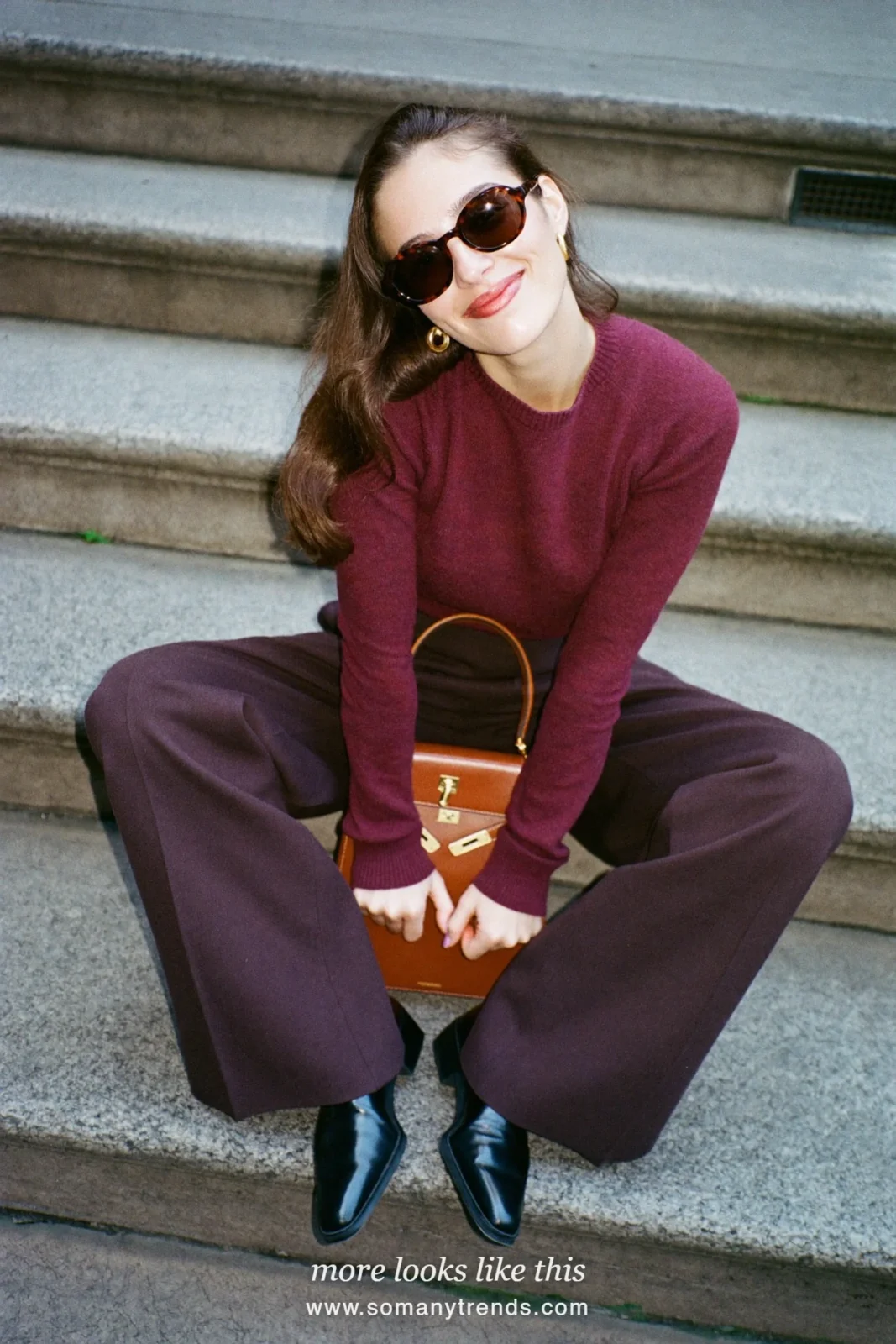 Plum knit sweater, plum wool wide-leg pants, cognac bag and black boots, outfit 25