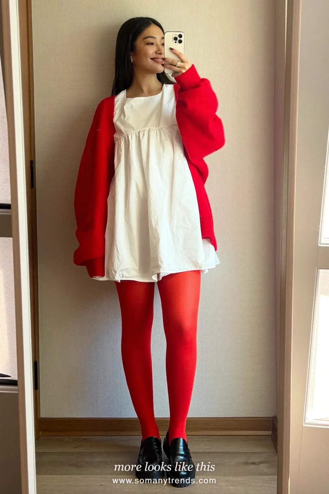 Woman in a red cardigan, white mini dress, red opaque tights and black loafers, outfit 27