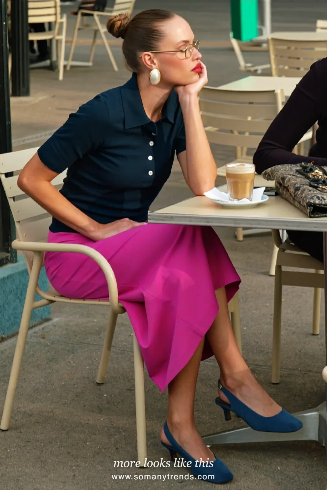 Woman in a fuchsia satin midi skirt, navy blue fine knit polo and navy slingbacks, outfit 8