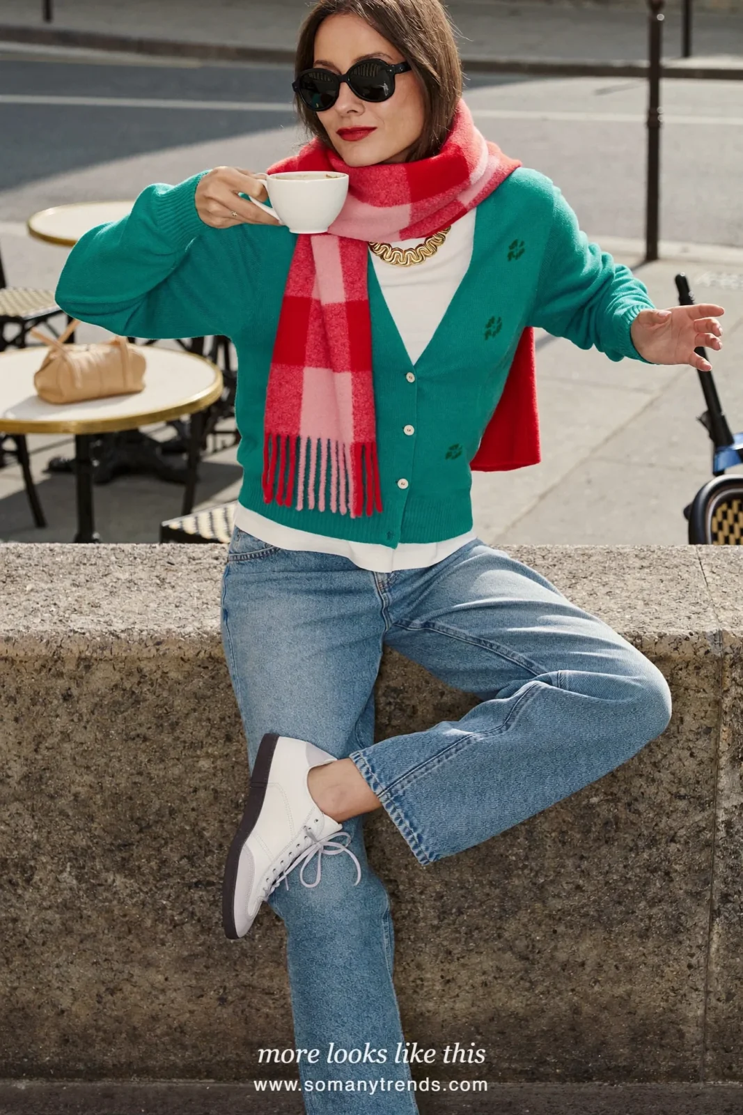 Teal cardigan with small green flowers over a white tee with straight blue jeans and a red and pink check scarf, outfit 2