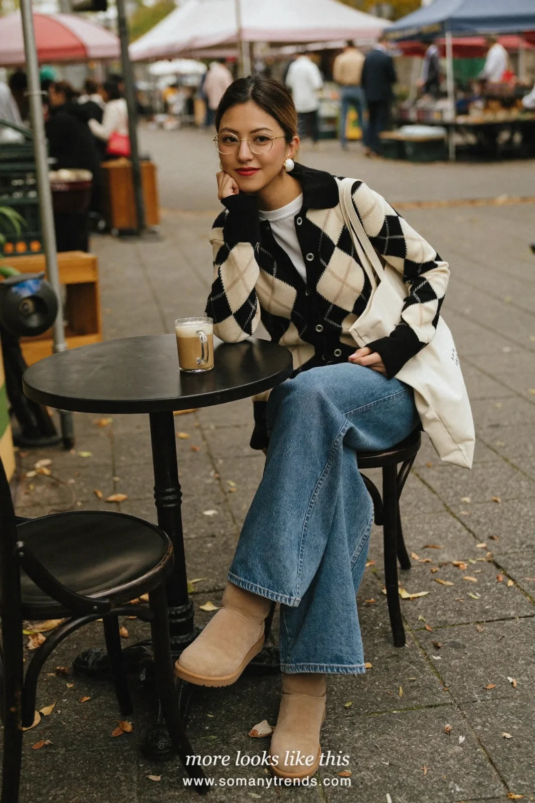 Black and ivory argyle cardigan over a white tee with straight blue jeans and beige suede ankle boots, outfit 8