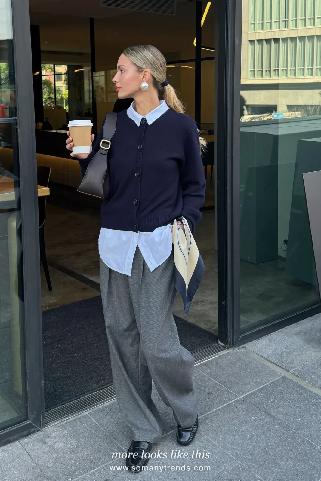 Navy cardigan over a white shirt with gray flannel wide-leg pants and black loafers, outfit 11