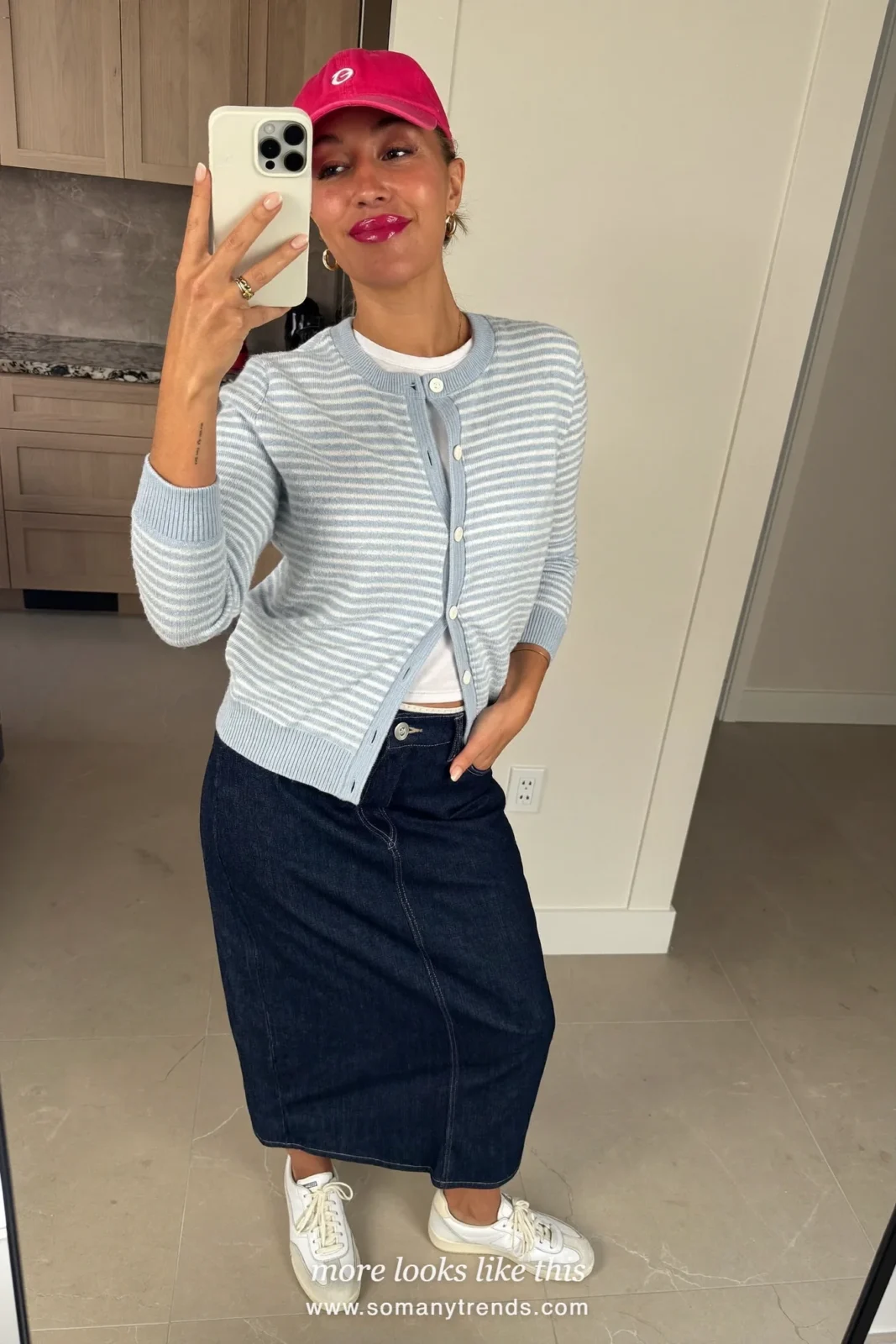 Light blue striped cardigan over a white tee with a dark denim midi skirt and white sneakers, outfit 21