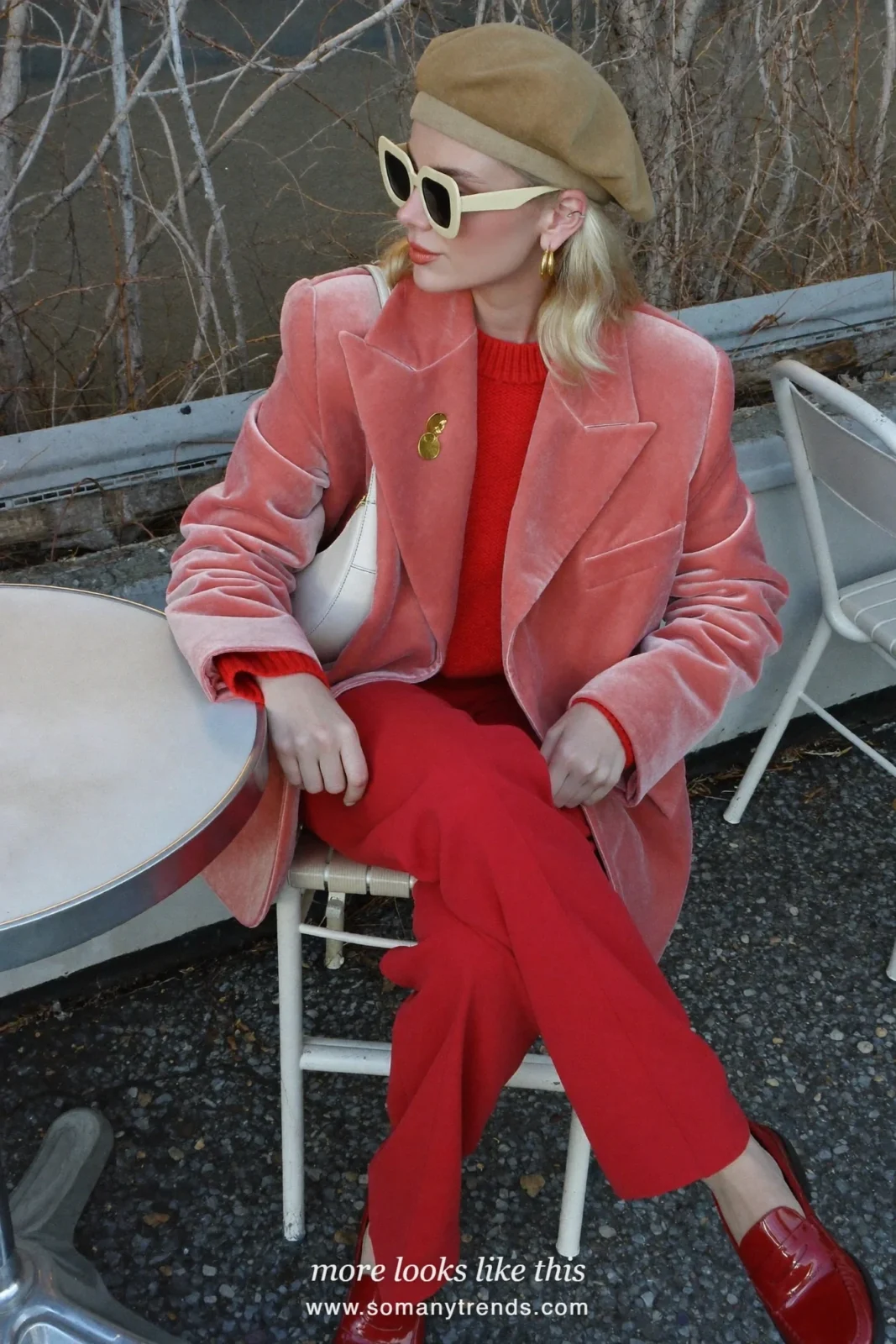 Woman in a rose pink velvet blazer, red knit, red wide pants and red patent loafers, outfit 11