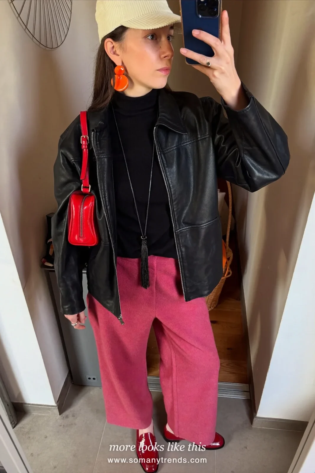 Old rose pink wide wool pants, black turtleneck, black leather jacket, cherry red patent loafers and red bag, outfit 6