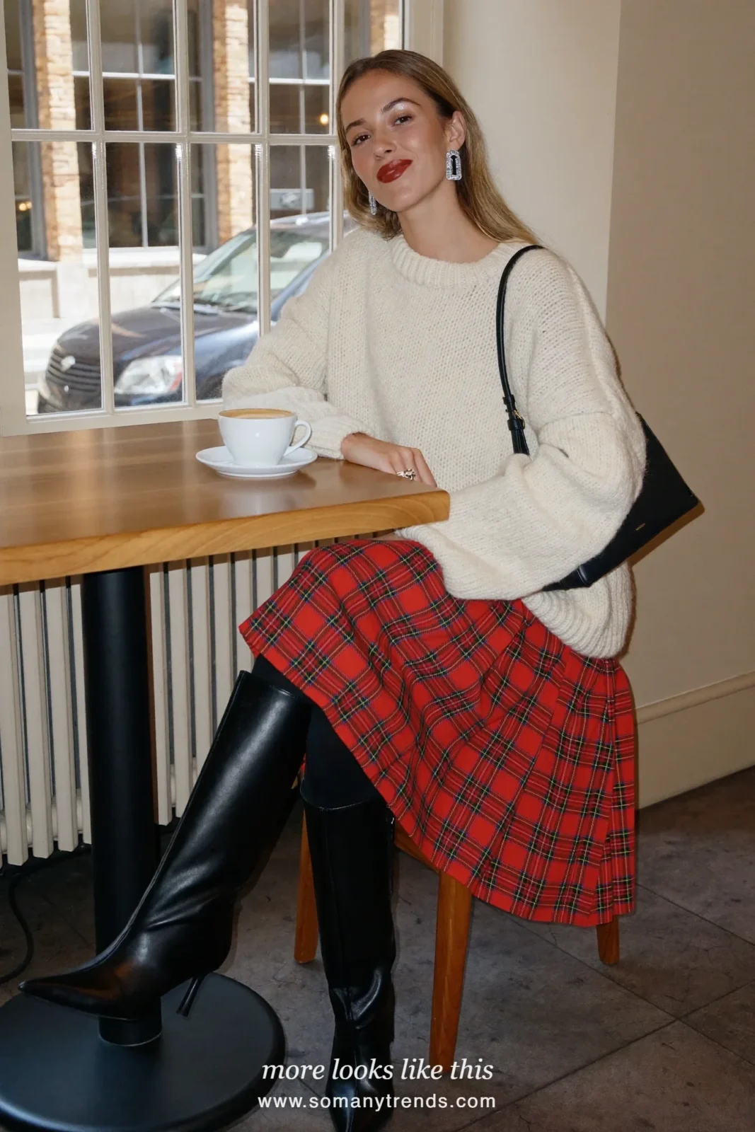 Cream chunky knit, red tartan pleated skirt to the knee, black opaque tights and black pointed knee-high boots, outfit 5