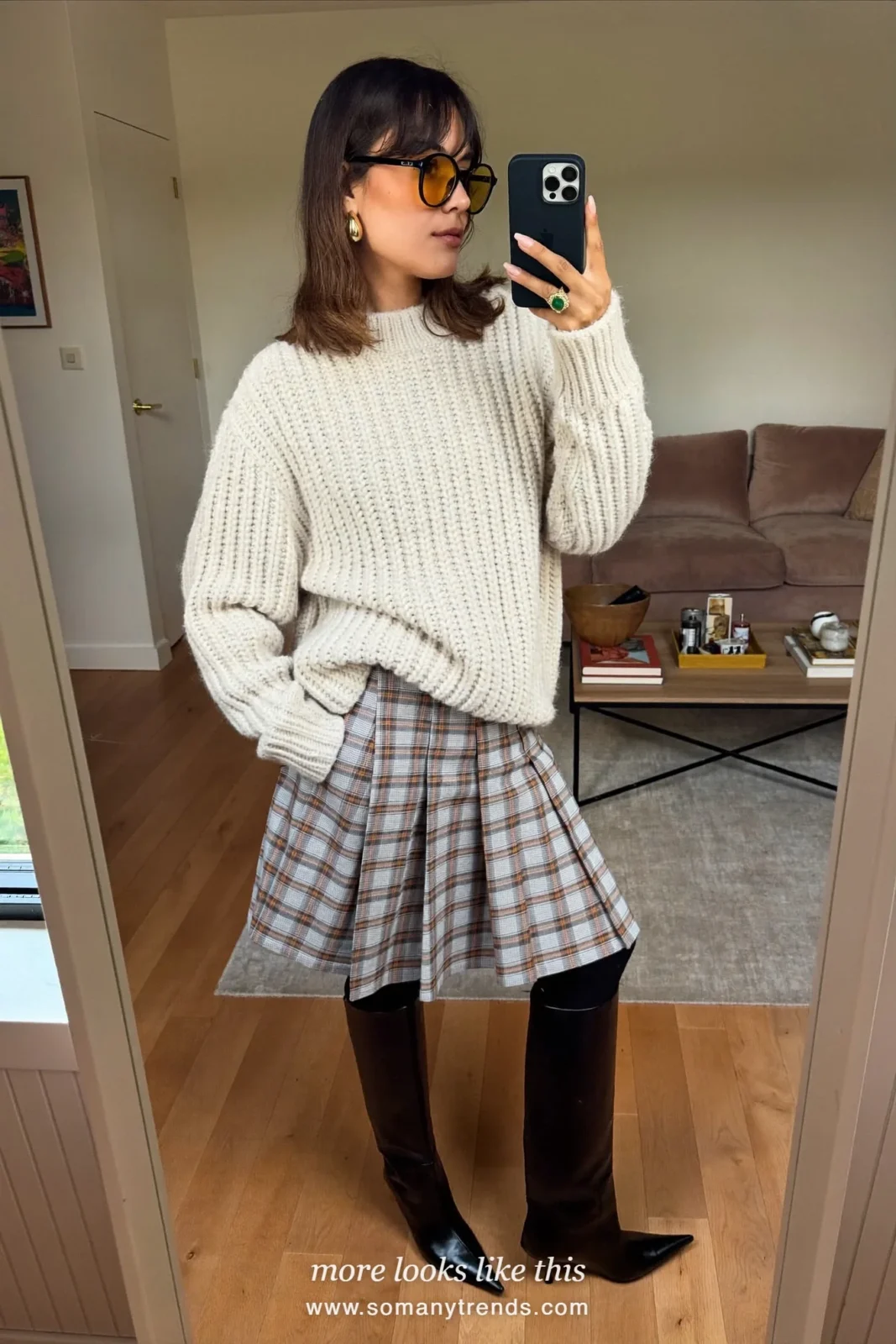 Cream chunky knit, plaid pleated skirt to the knee, black opaque tights and black pointed knee-high boots, outfit 9