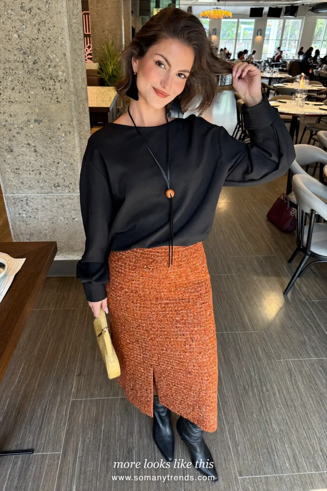 Black velvet-feel top, rust tweed midi skirt, black pointed knee-high boots and gold-toned bag, outfit 23