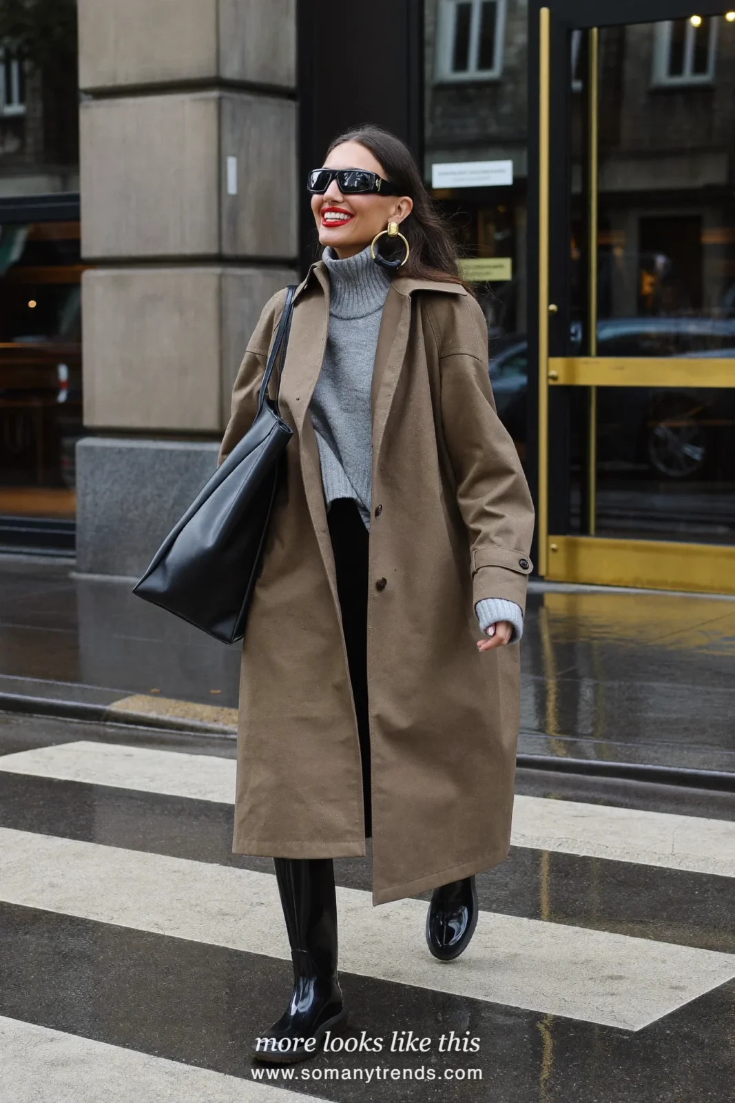 Woman in black tall rain boots, black pants, gray turtleneck and knee-length khaki mac worn open outside an office, outfit 8