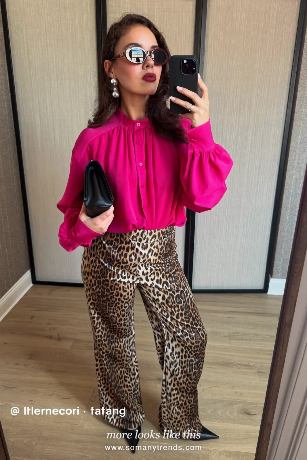 Woman in fuchsia blouse, black and tan leopard satin pants, black pointed pumps and black clutch, outfit 15