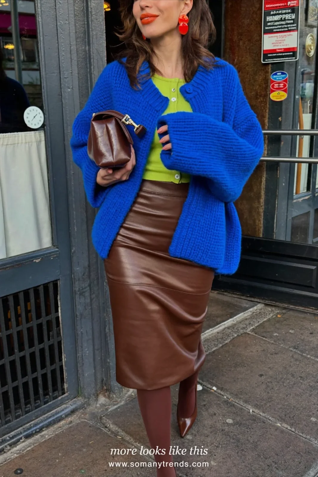 Woman in a cobalt blue cardigan over a lime green knit with a chocolate brown leather pencil skirt, brown tights and brown pumps, outfit 14