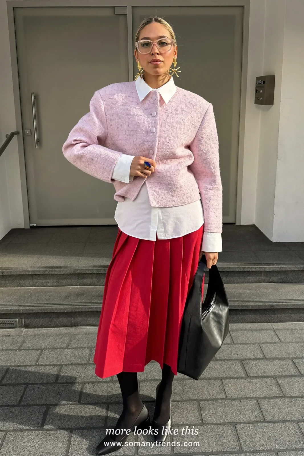 Pink boxy tweed jacket, white shirt, red pleated midi skirt, black tights and black block-heel pumps, outfit 11