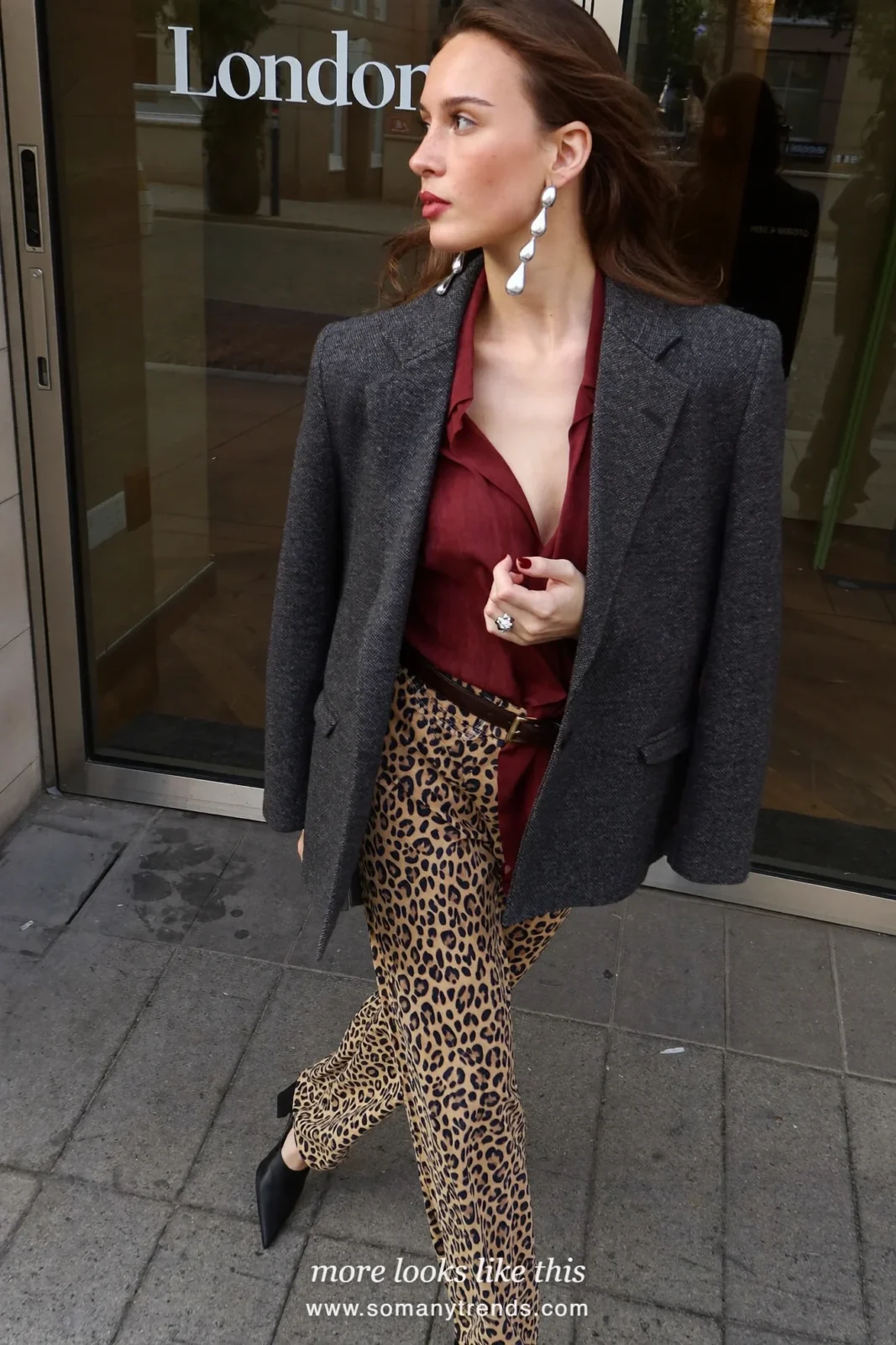 Woman in a relaxed gray blazer, burgundy blouse, leopard print straight pants and black pumps, outfit 8
