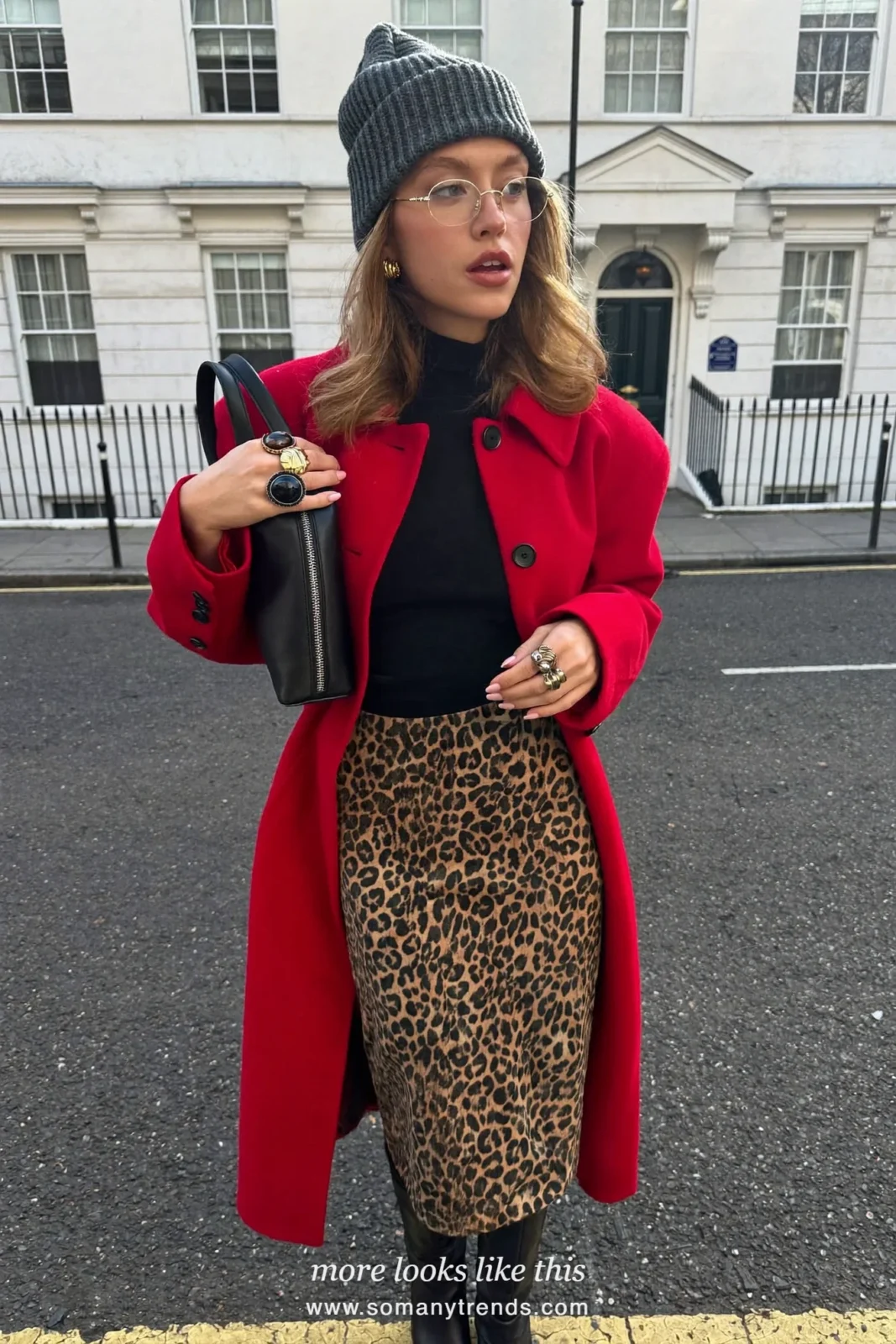 Woman in a red wool coat, black turtleneck, leopard print midi slip skirt and black knee boots, outfit 19
