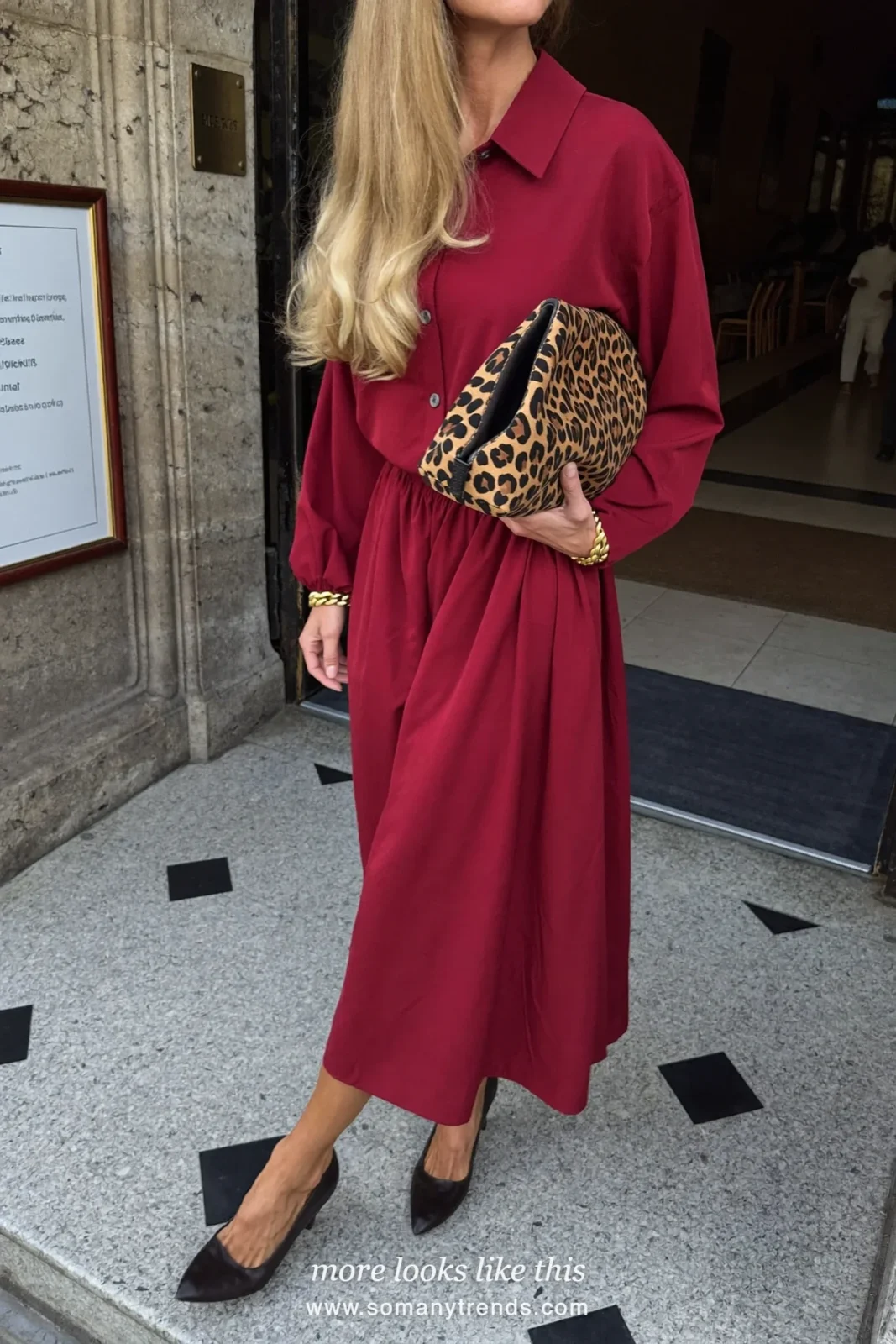 Woman in a burgundy midi dress, leopard print clutch and black pointed pumps, outfit 23