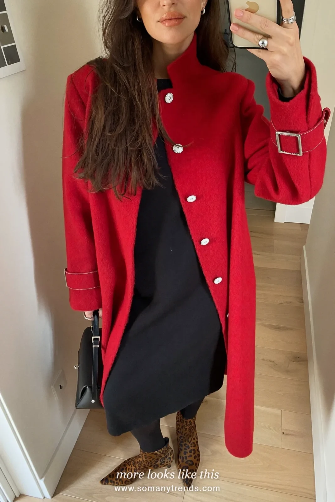 Woman in a red wool coat, black dress, black tights and leopard print ankle boots, outfit 27