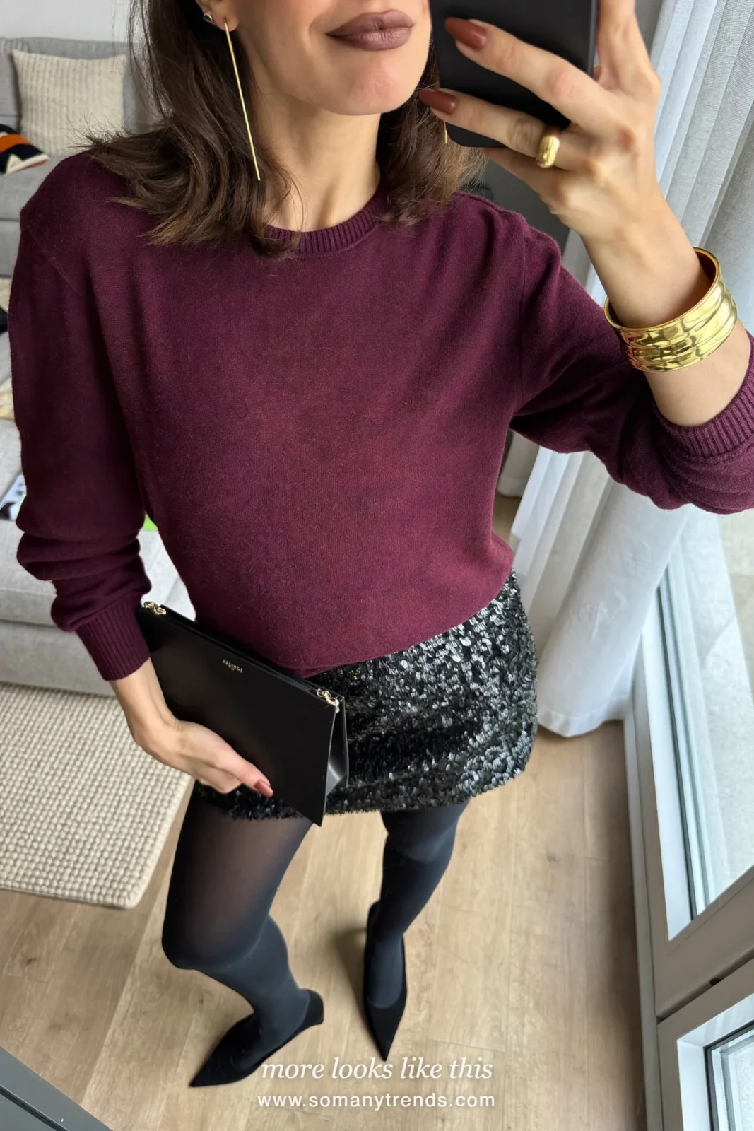 Woman in a black sequin mini skirt, deep burgundy fine knit top, sheer black tights and black heels, outfit 6