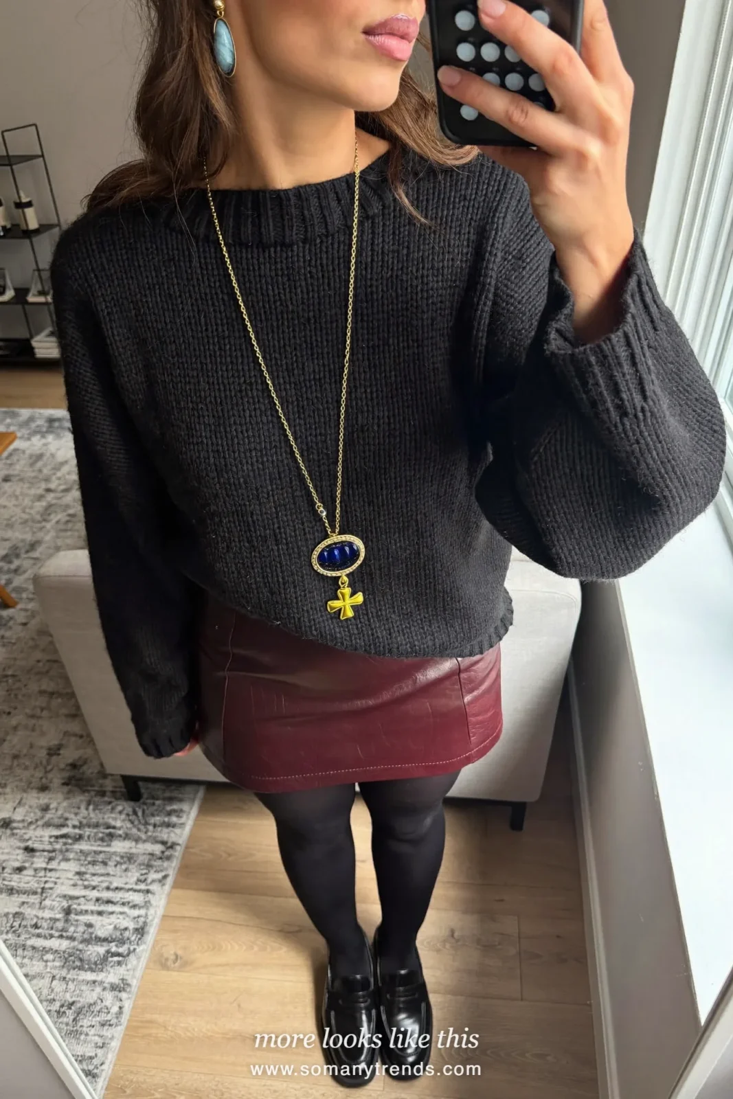 Woman in a black chunky knit sweater, deep burgundy mini skirt, black opaque tights and chunky loafers, outfit 15