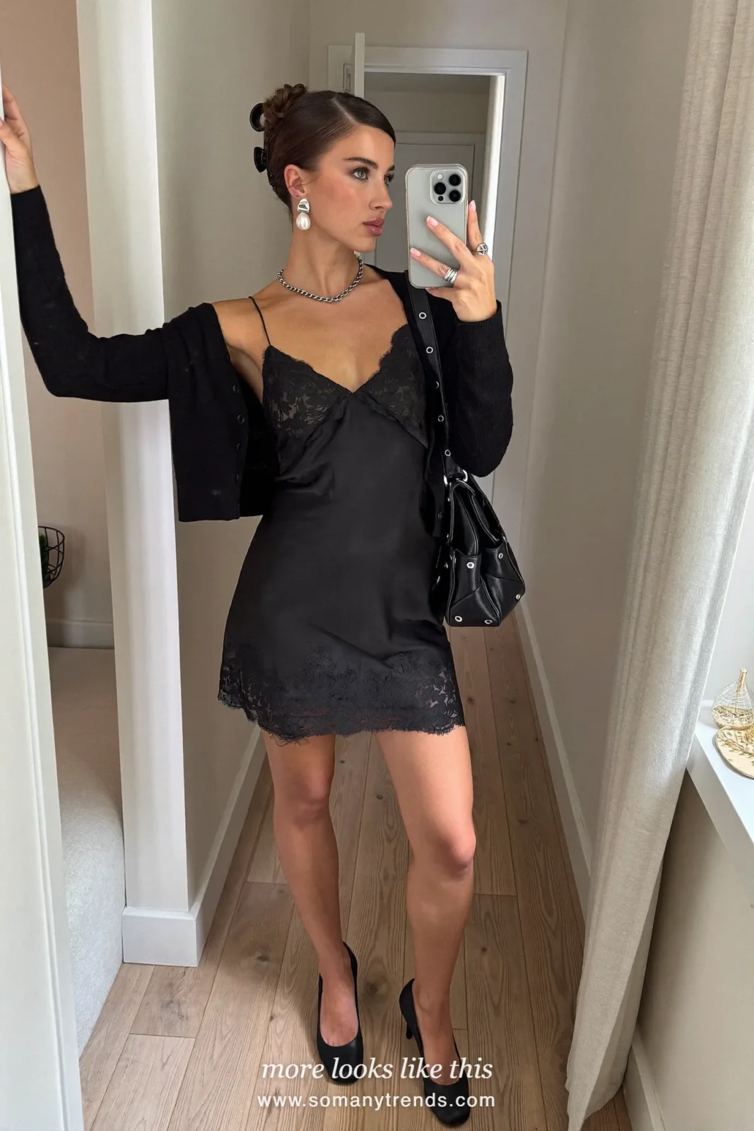 Woman in a black lace-trim slip dress with opaque burgundy tights and black heels, outfit 18