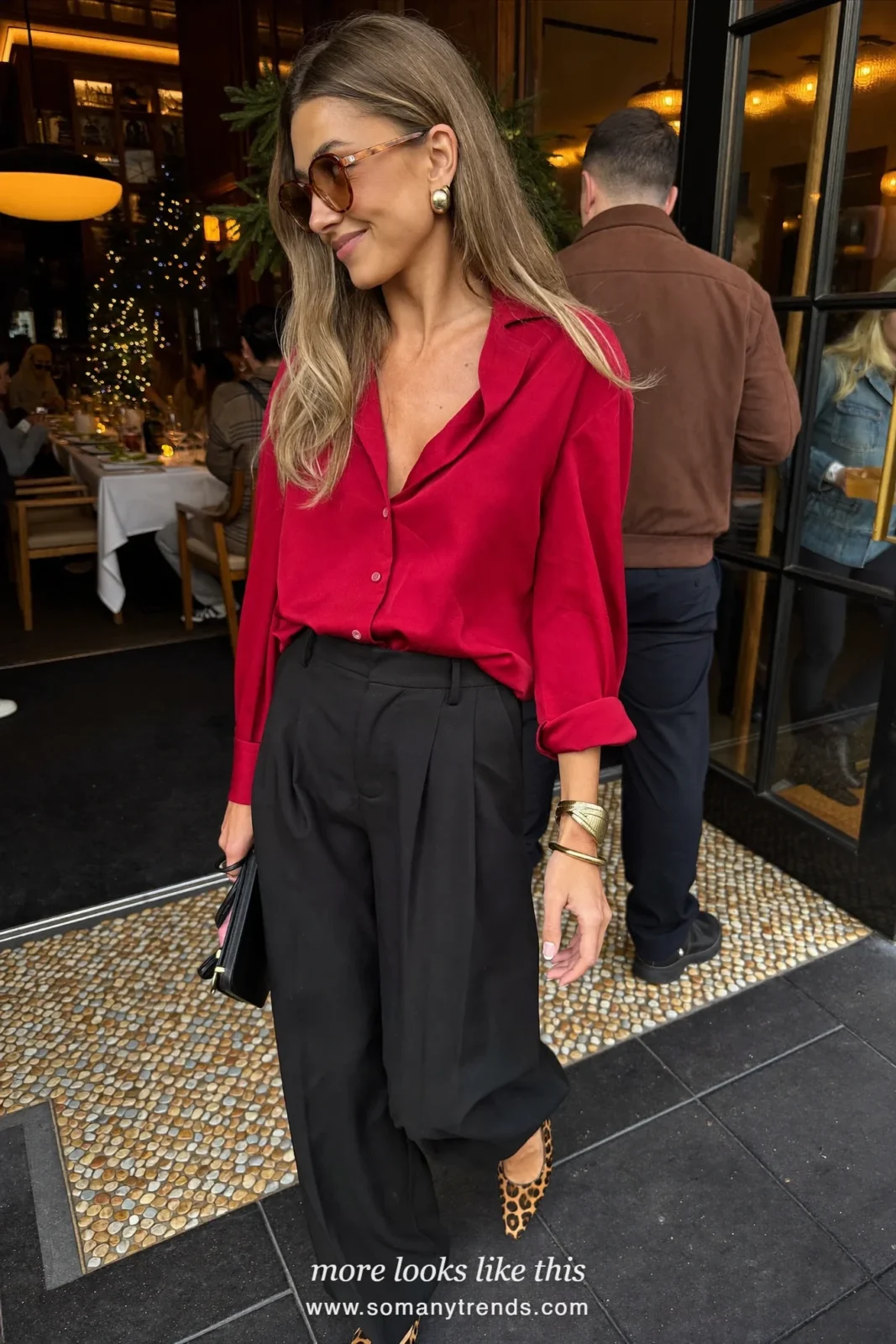 Woman in a red satin blouse, black wide-leg pants and leopard print pointed flats, outfit 22
