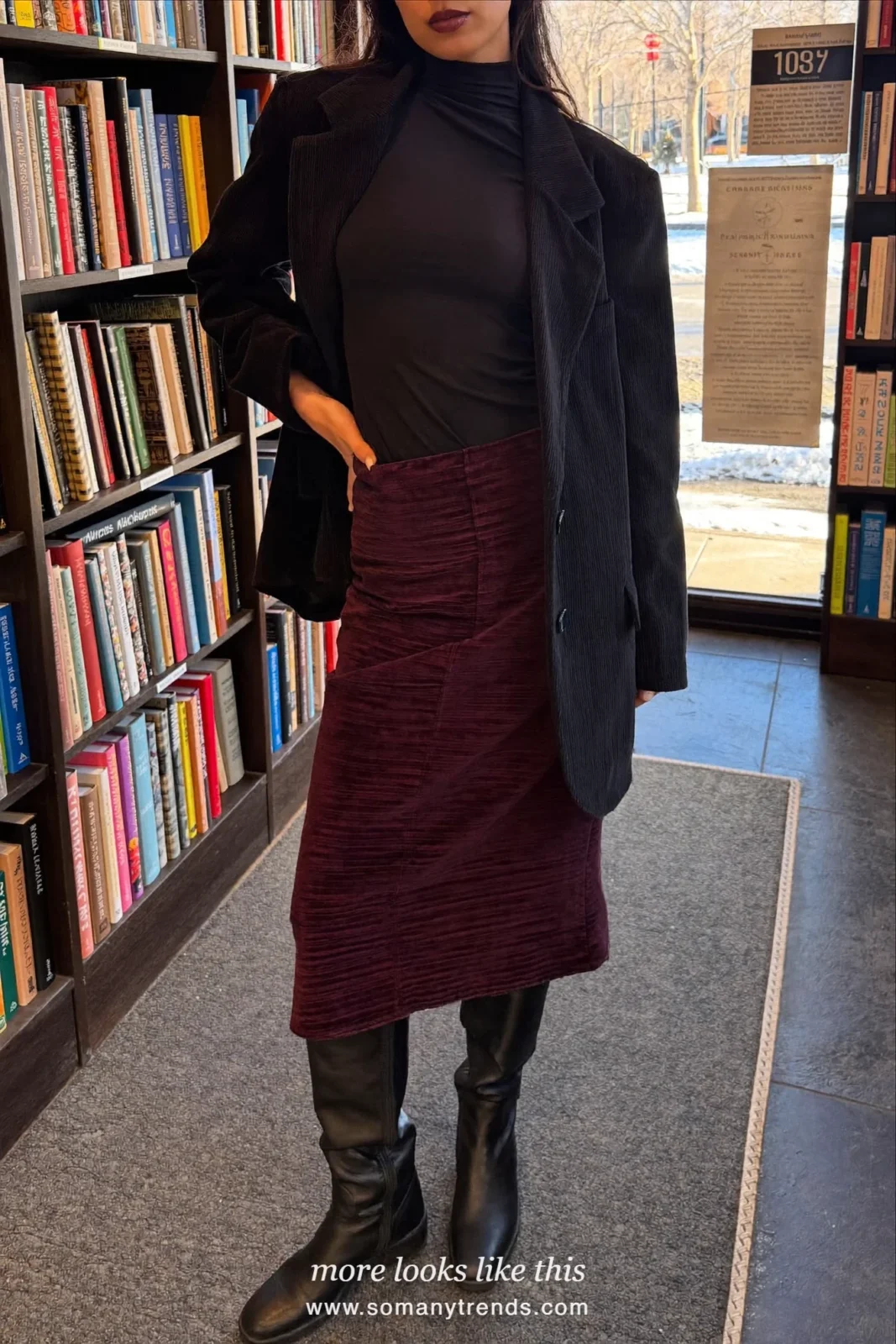 Woman in a black oversize blazer, burgundy corduroy midi skirt and black boots, outfit 14
