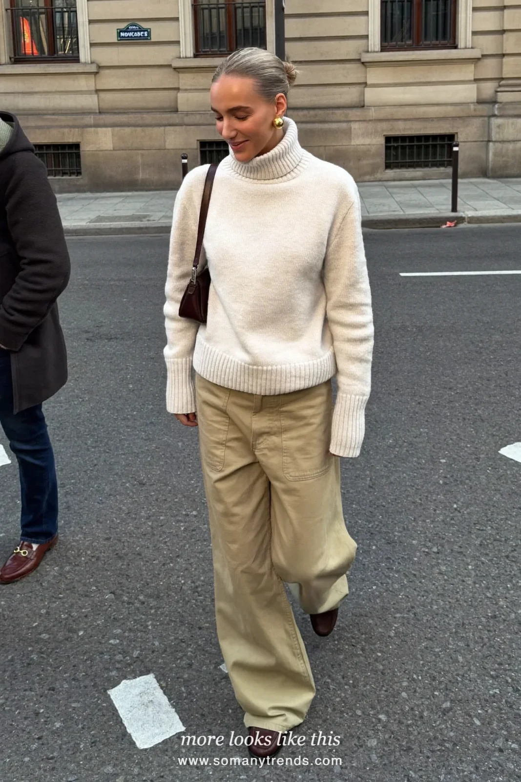 Look 11: cream roll-neck sweater, khaki wide-leg pants, chocolate belt and brown loafers