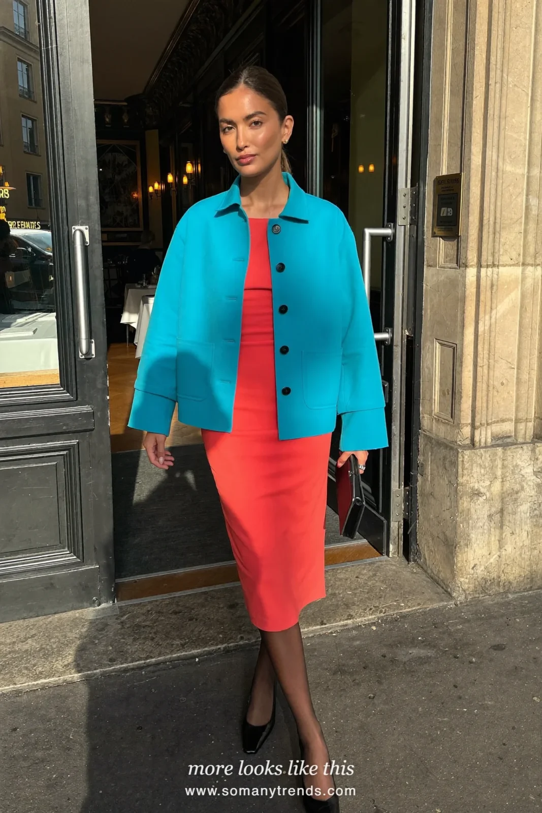 Woman in a coral red midi dress, short aqua jacket, black tights and pumps, outfit 19