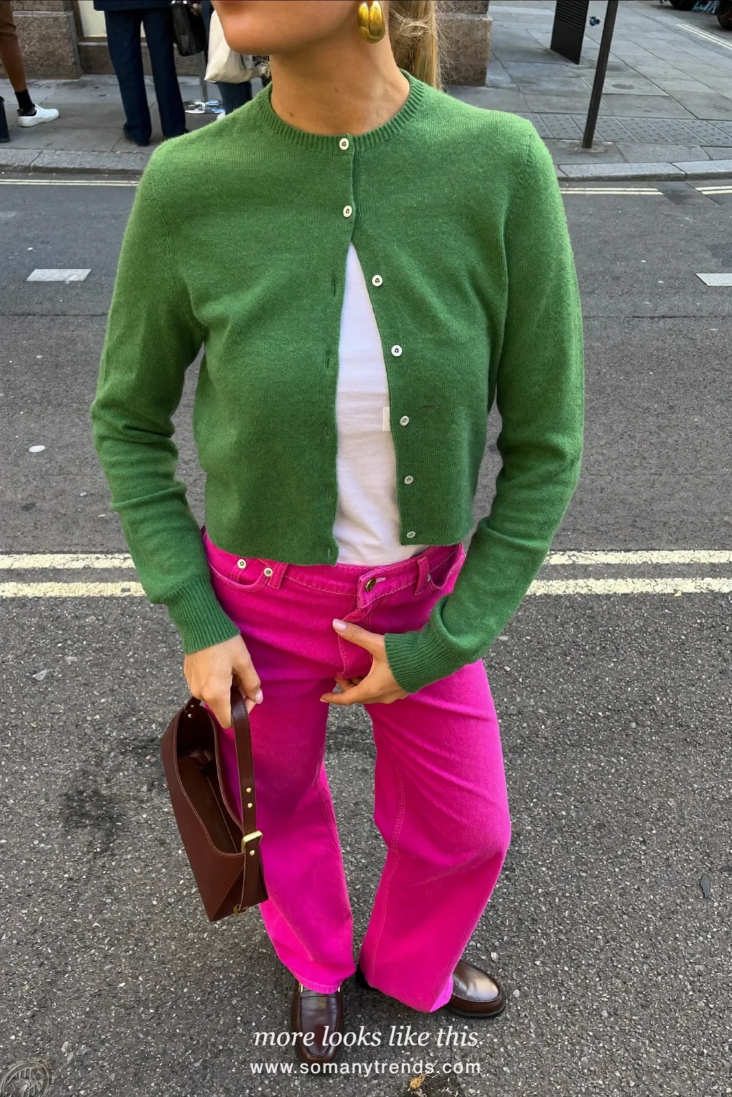 Woman in a thin moss green cardigan, white tee, bright pink wide-leg pants and brown loafers with white socks, outfit 2
